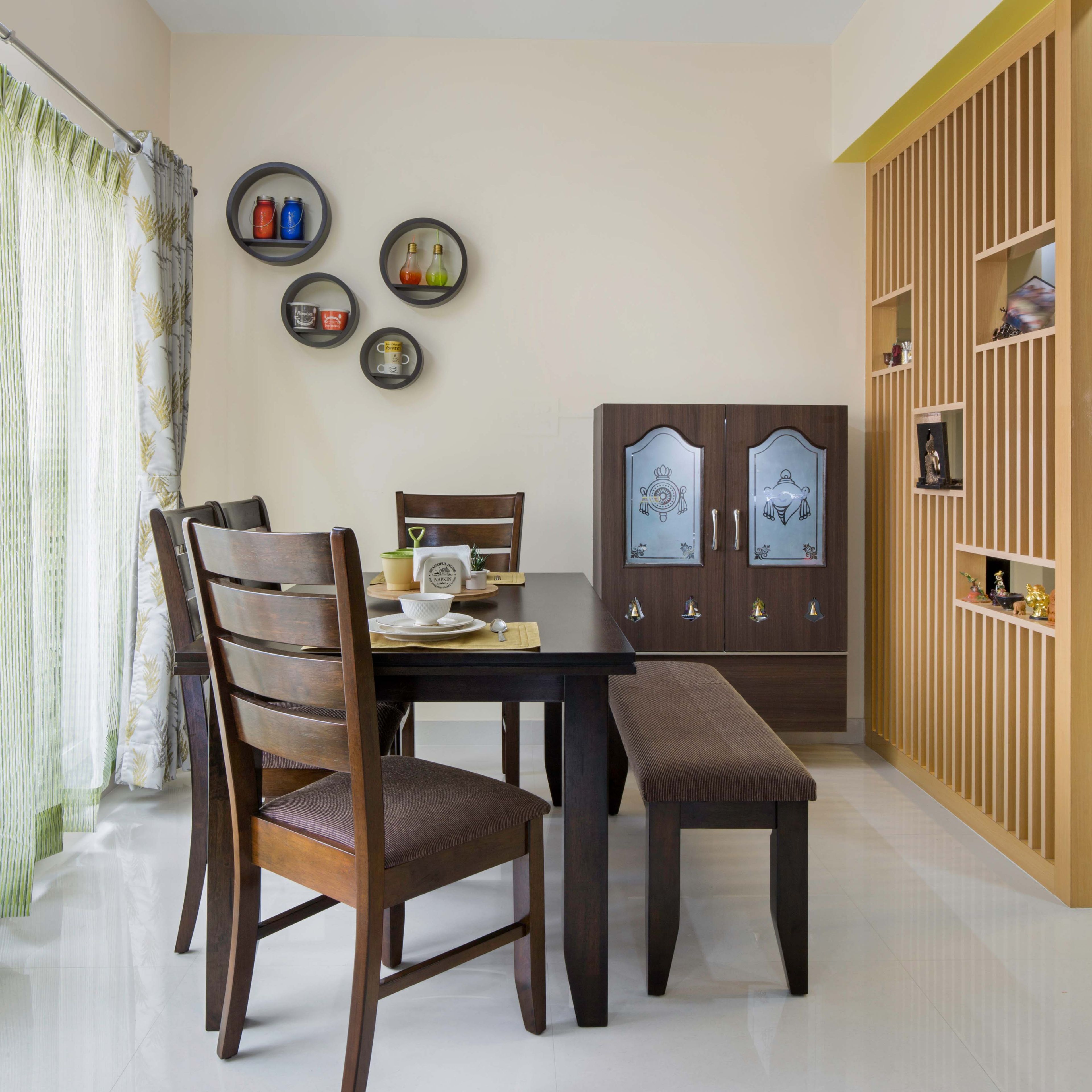 4-seater wooden dining room design with wooden seater - Livspace