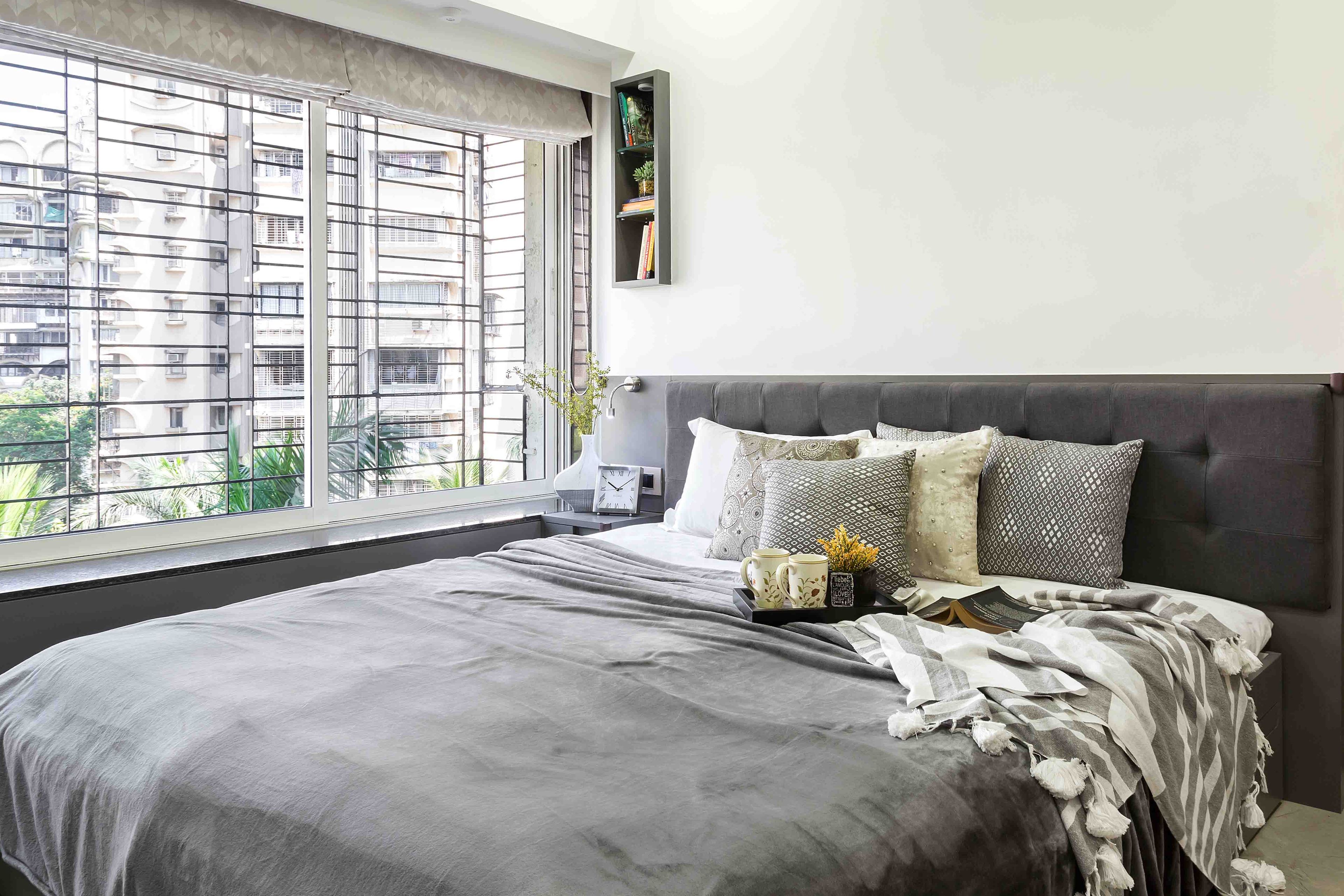 Grey guest room design - Livspace