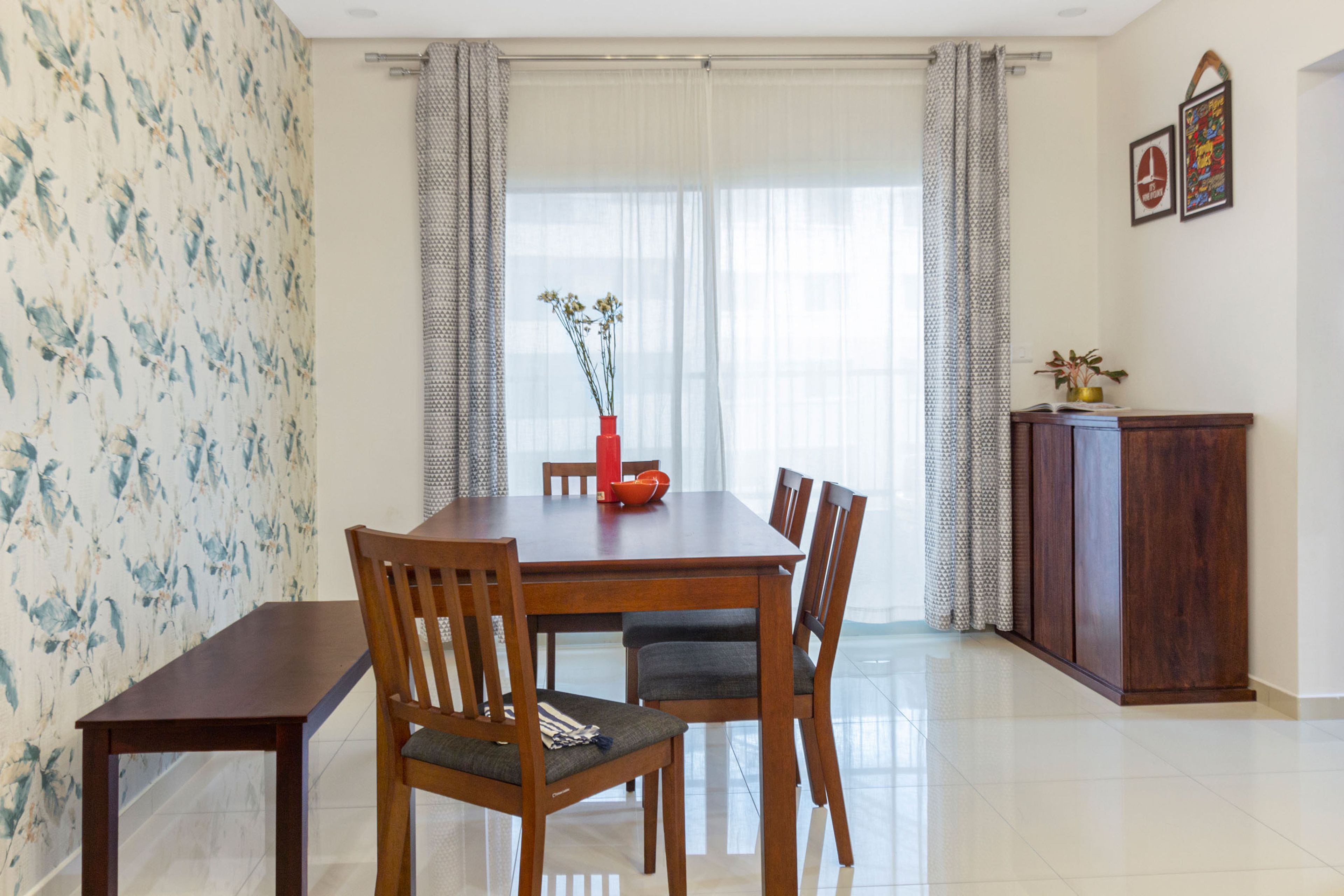 4-seater wooden dining room design with wooden seater - Livspace