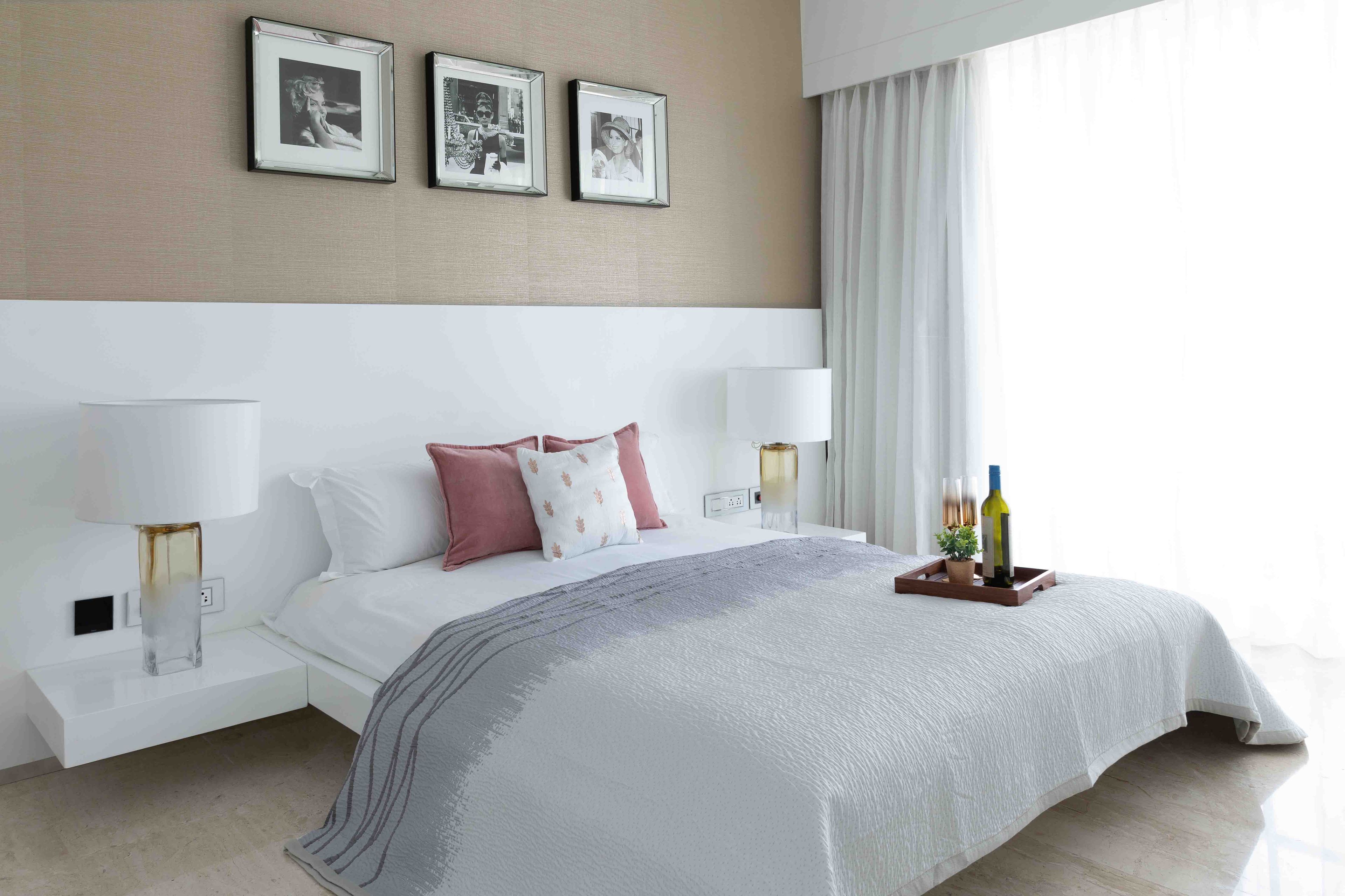 Dual-toned master bedroom design in white and beige - Livspace