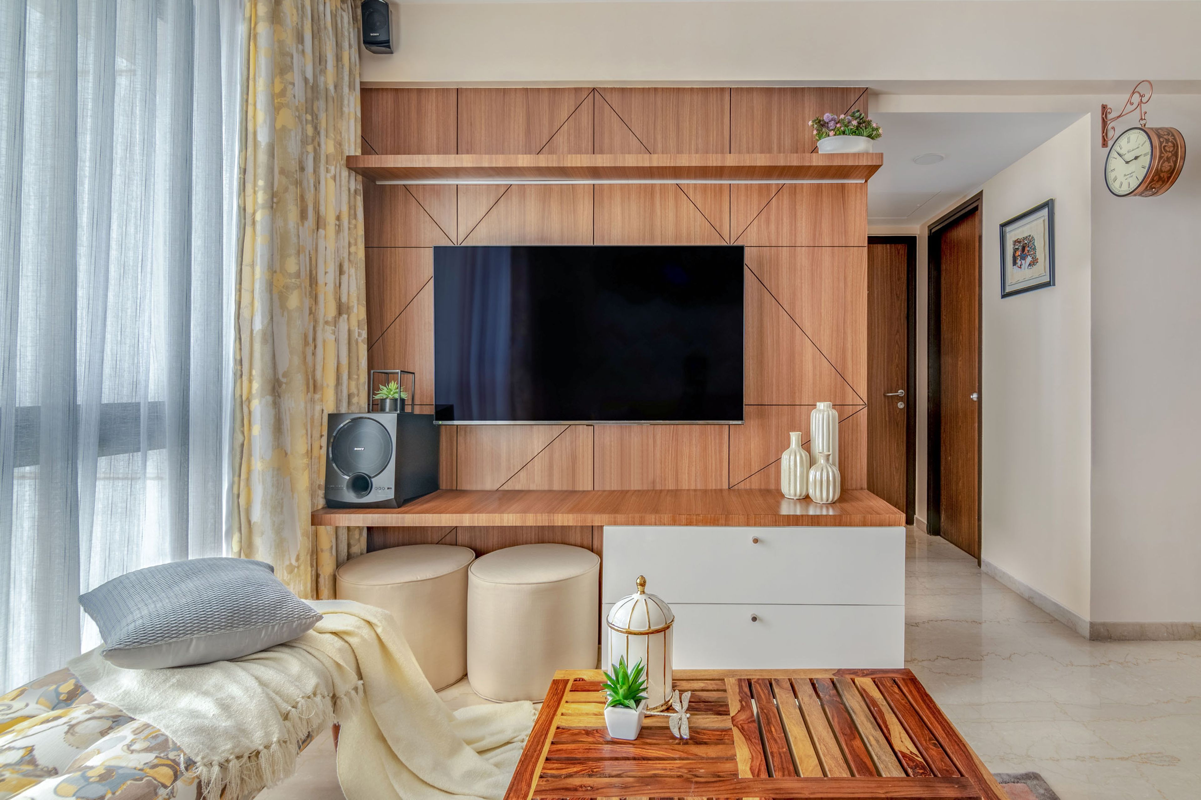 White and wood TV Unit design - Livspace