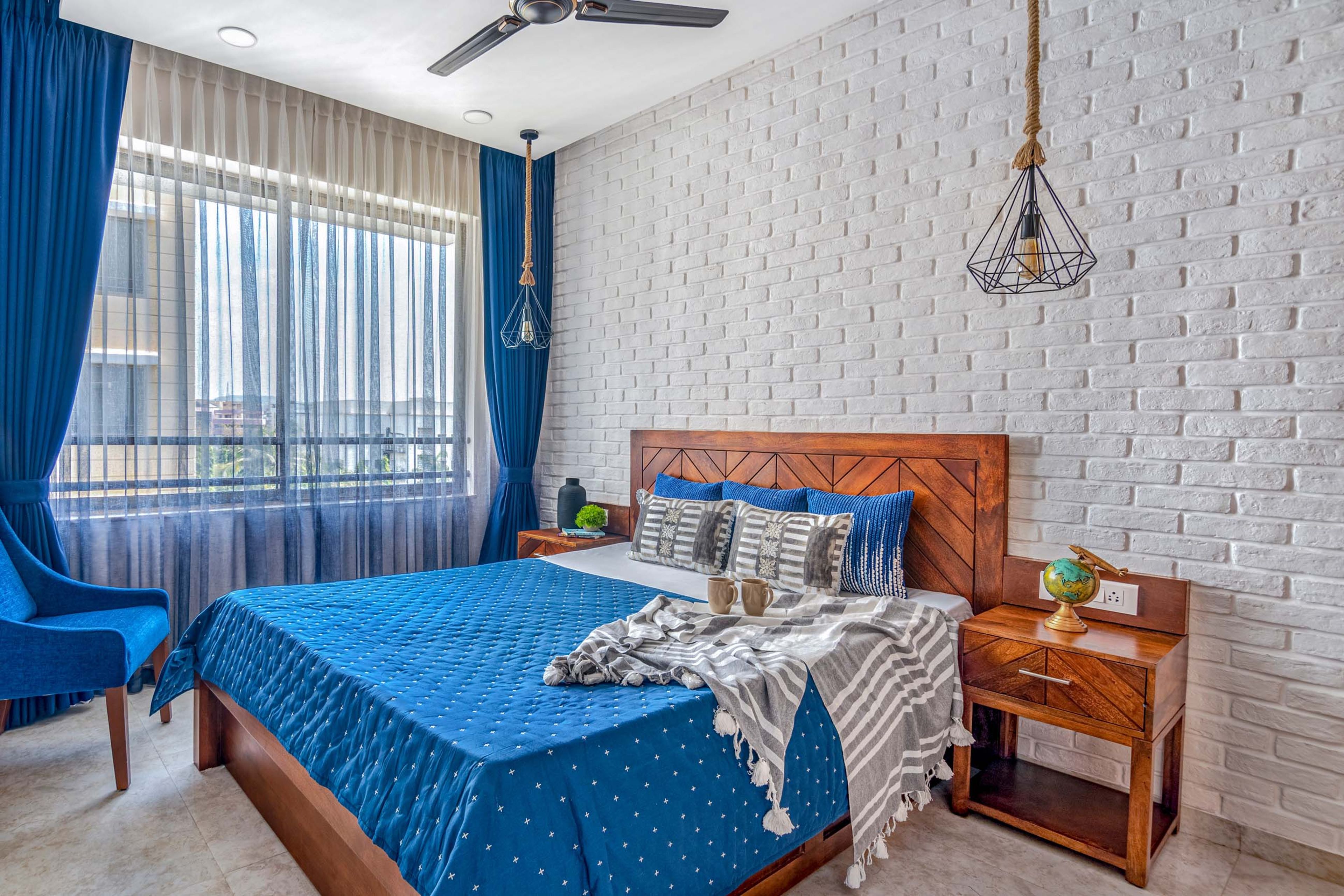 Classic 2-BHK Flat In Mumbai With Elegant Wall Designs