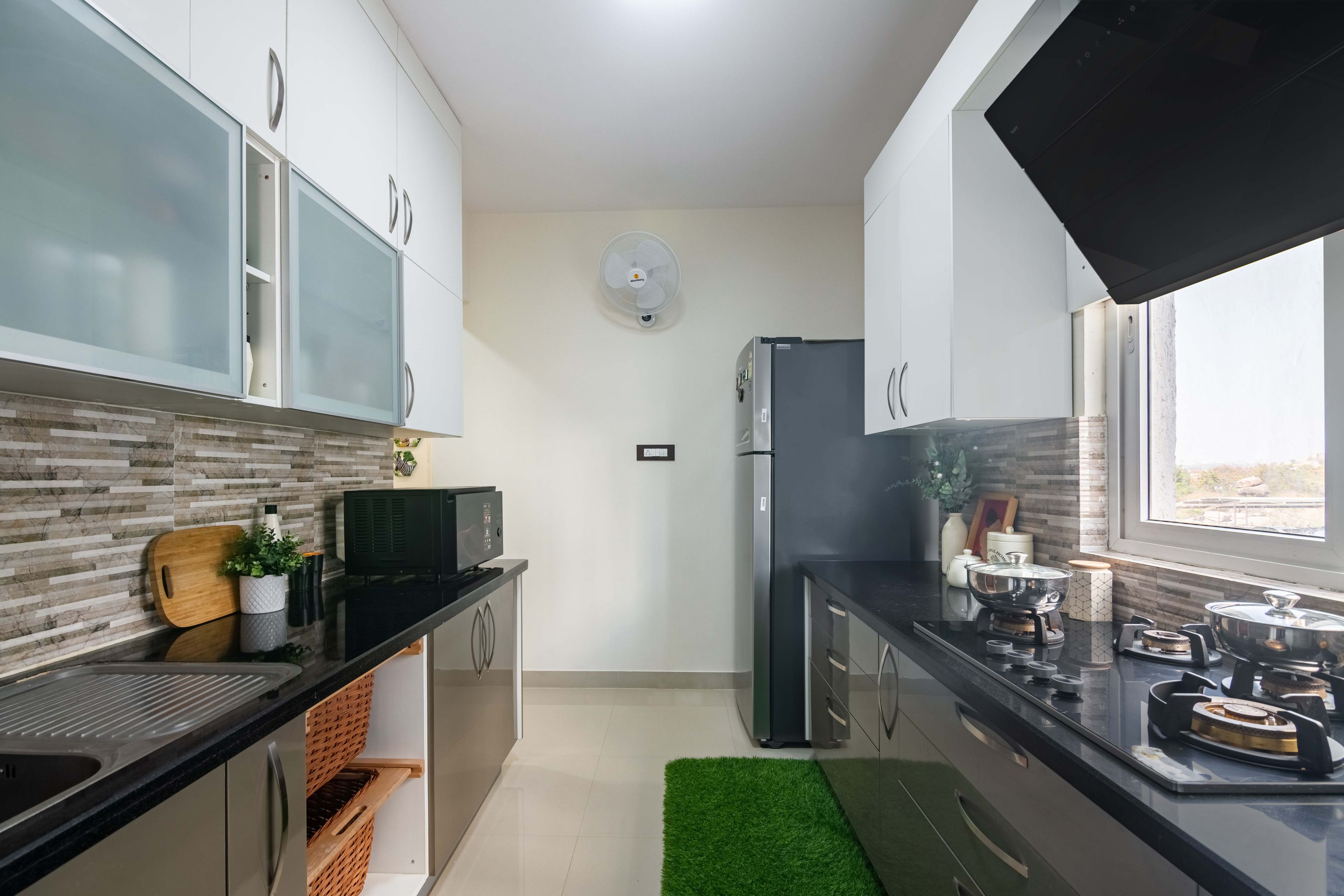 Modern Parallel Kitchen Design with Cappuccino and Frosty White Cabinets