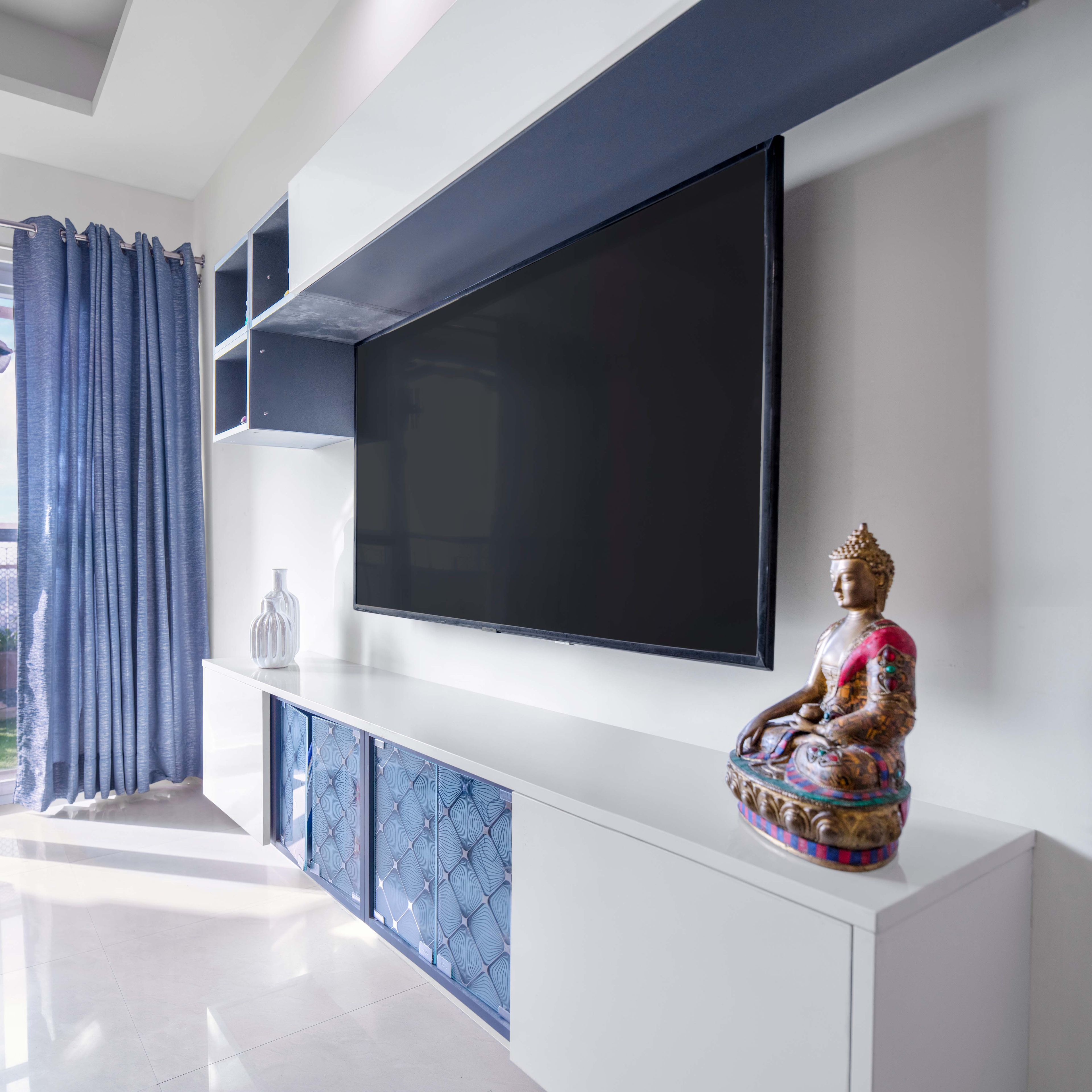 Denim Suedette And Frosty White TV Unit Design - Livspace