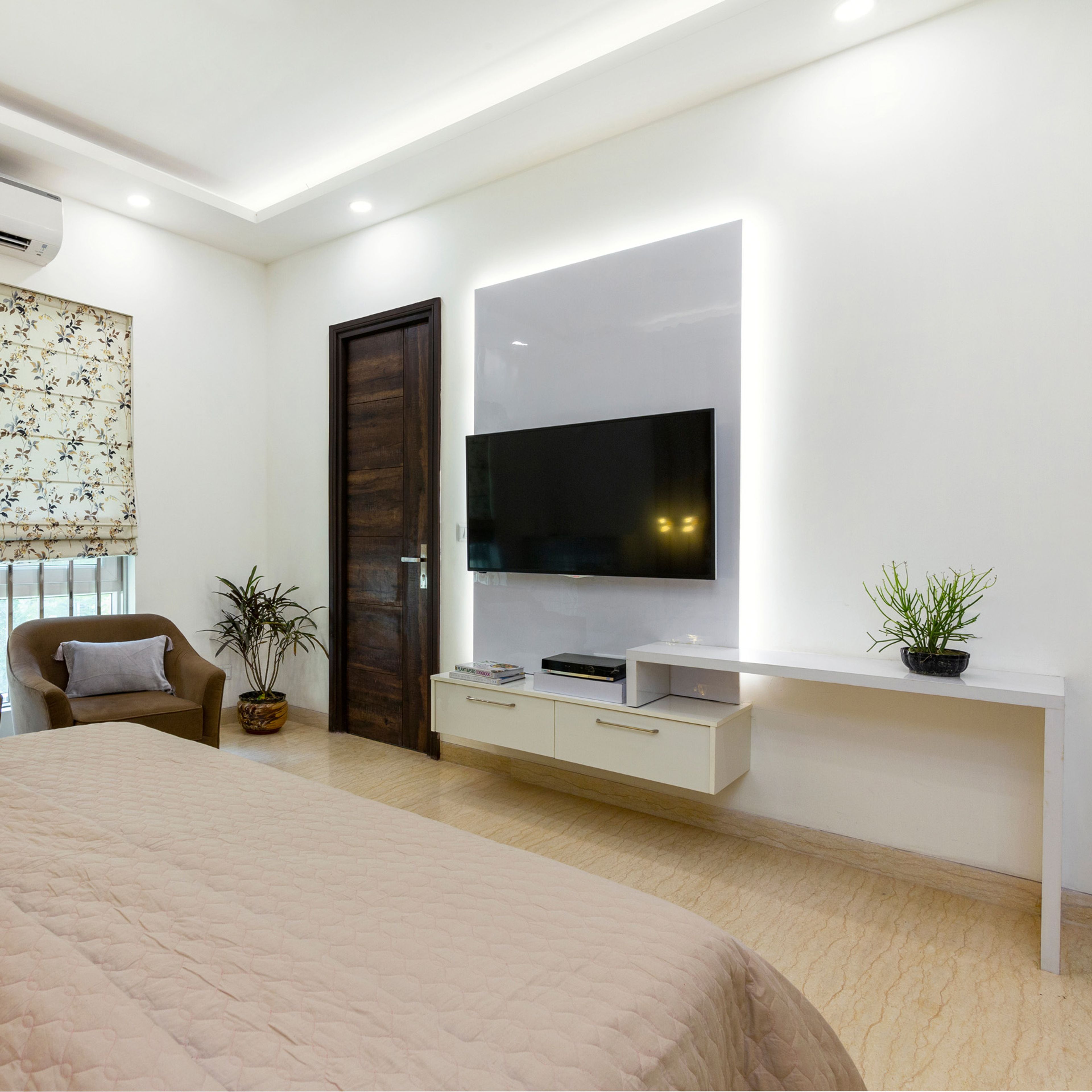 Frosty White And Champagne Toned TV Unit Design - Livspace