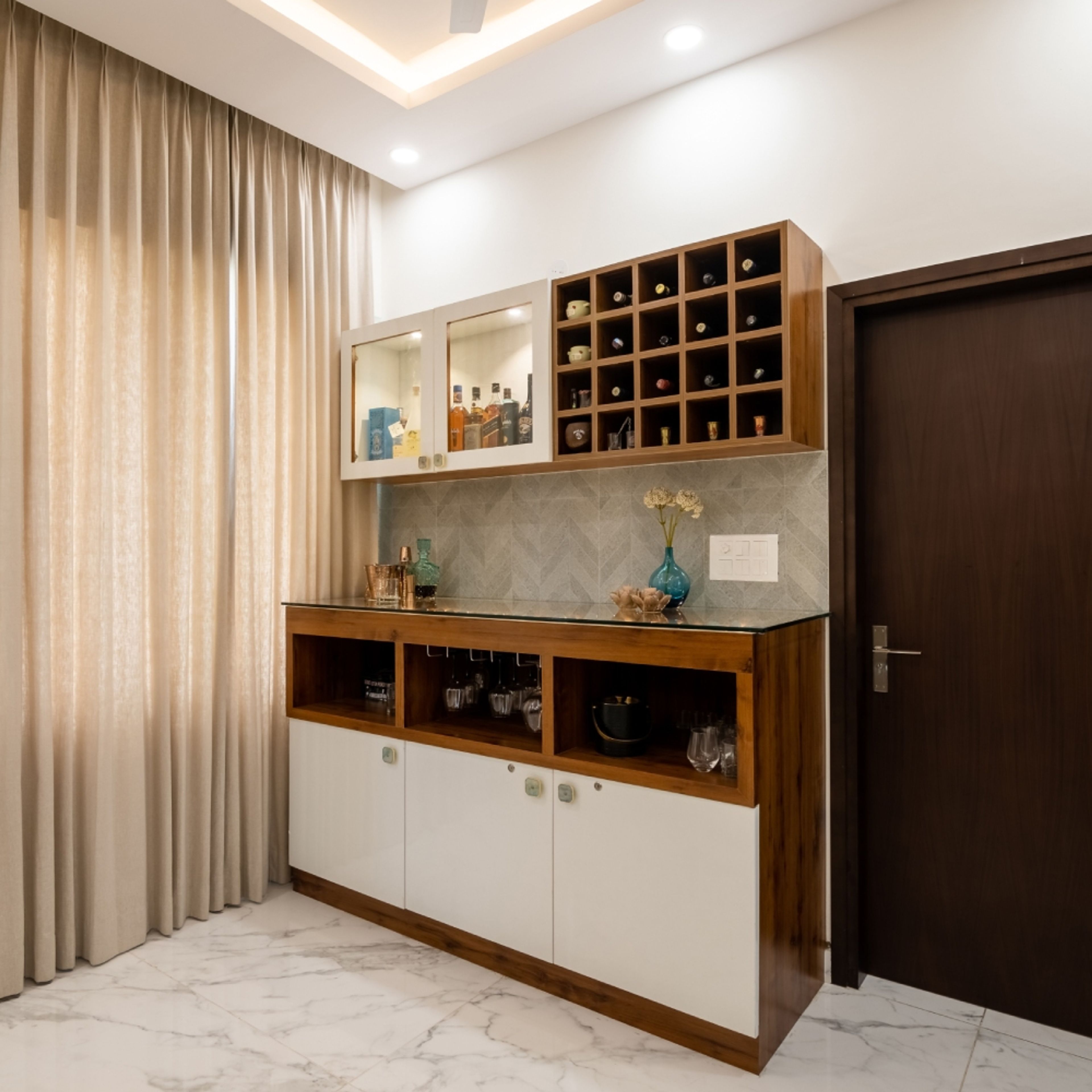 Modern Home Bar Design with Bronze and White Finishes