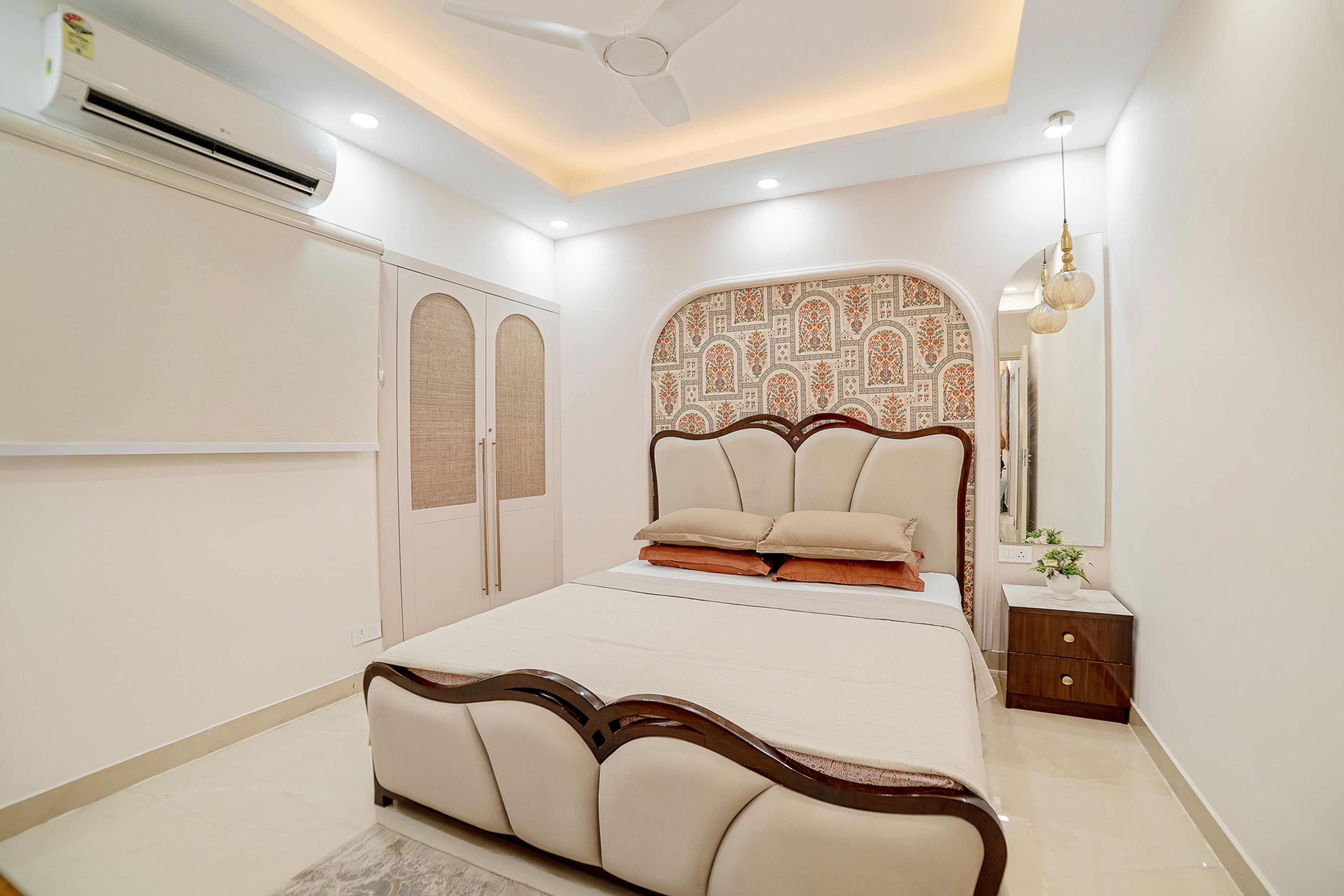 Indian Traditional Guest Bedroom Design with Curved Upholstered Bed Frame and 2-Door Wardrobe