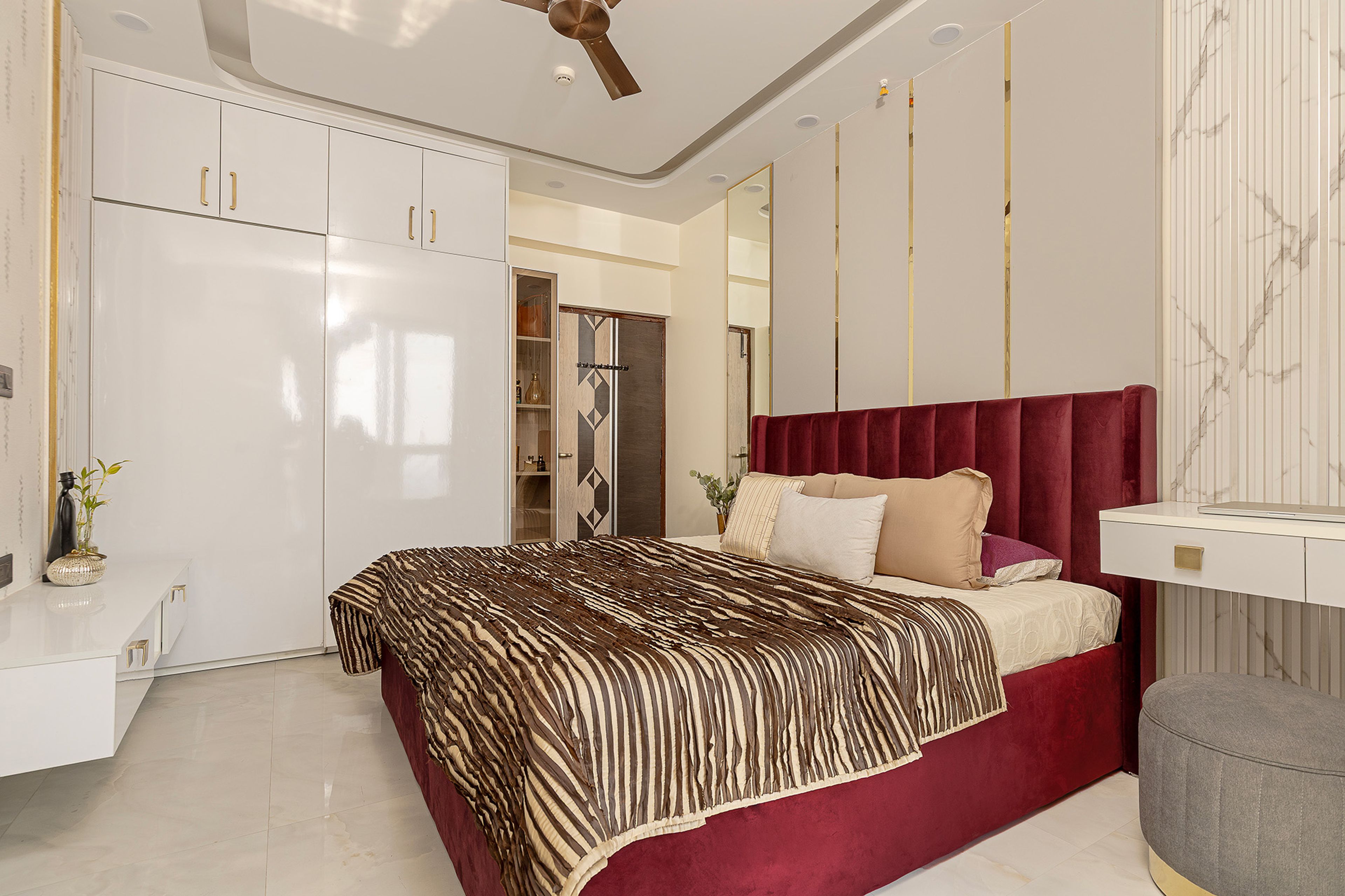 Modern Master Bedroom Design with Velvet Headboard Bed, Floating White Consoles and Wardrobe
