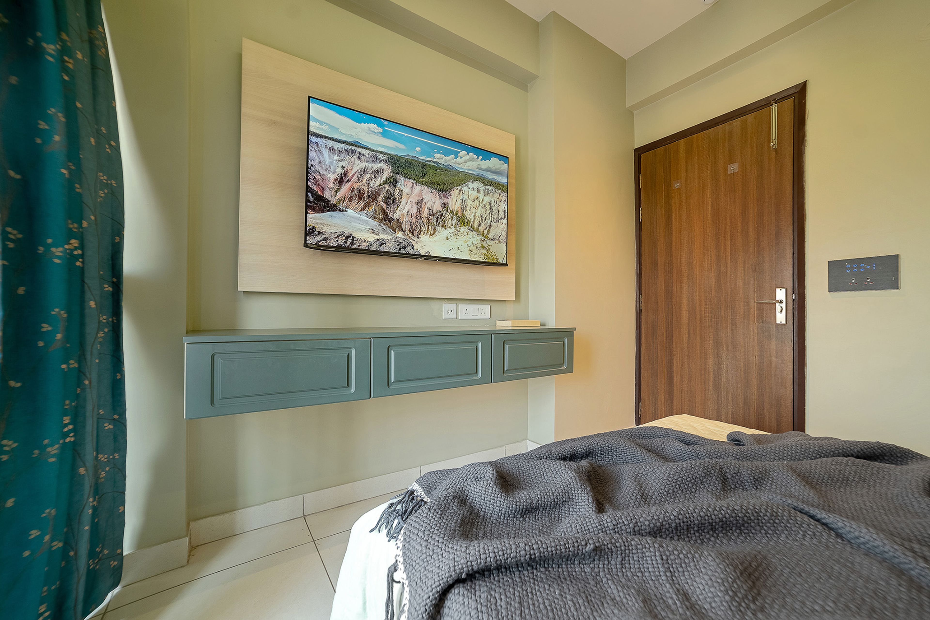 Modern Floating TV Unit Design in Greenish-Blue and Wood Finish