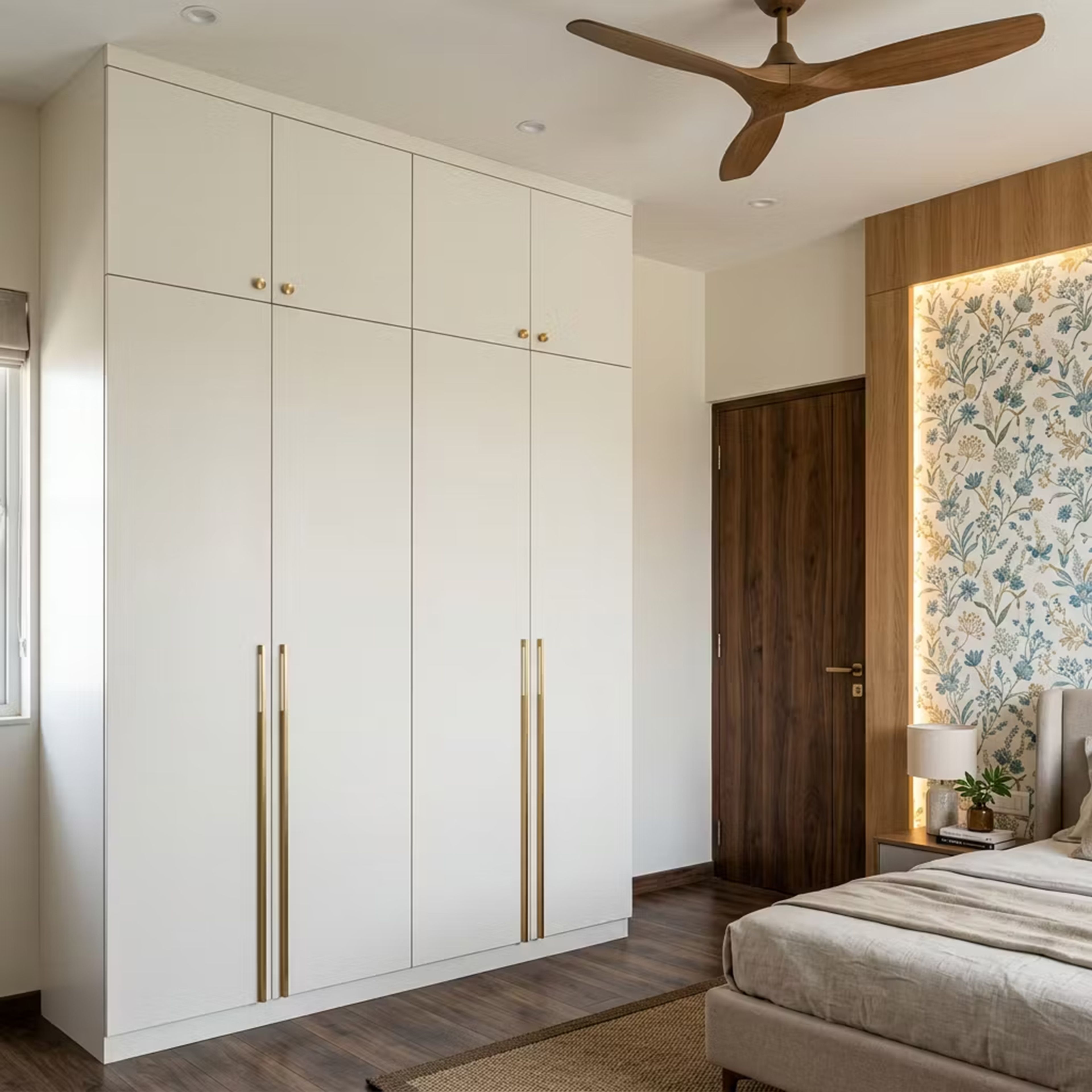 Modern White 4-Door Swing Wardrobe Design with Brass Handles