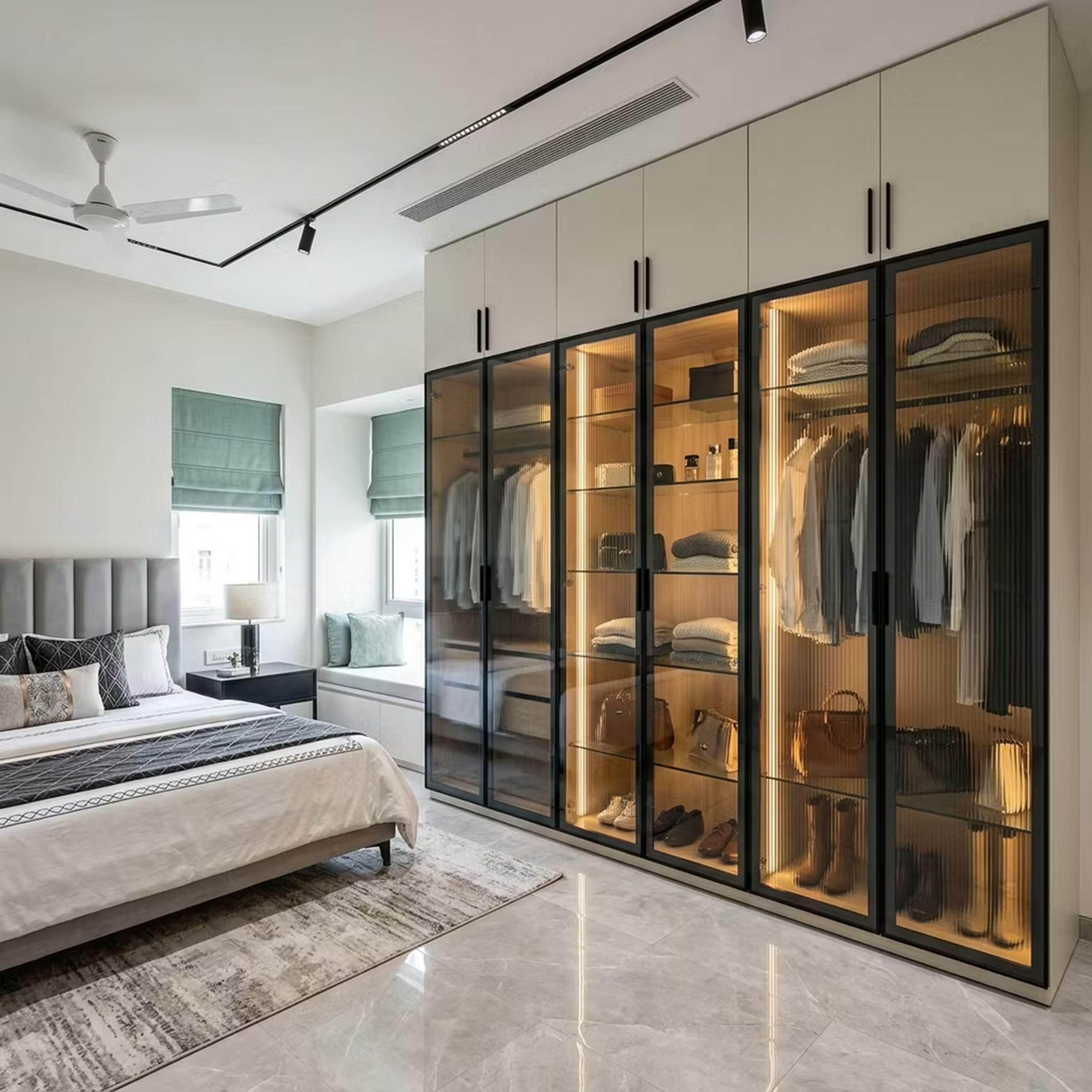White 6-Door Swing Wardrobe Design with Fluted Glass Shutters and Internal LED Lighting