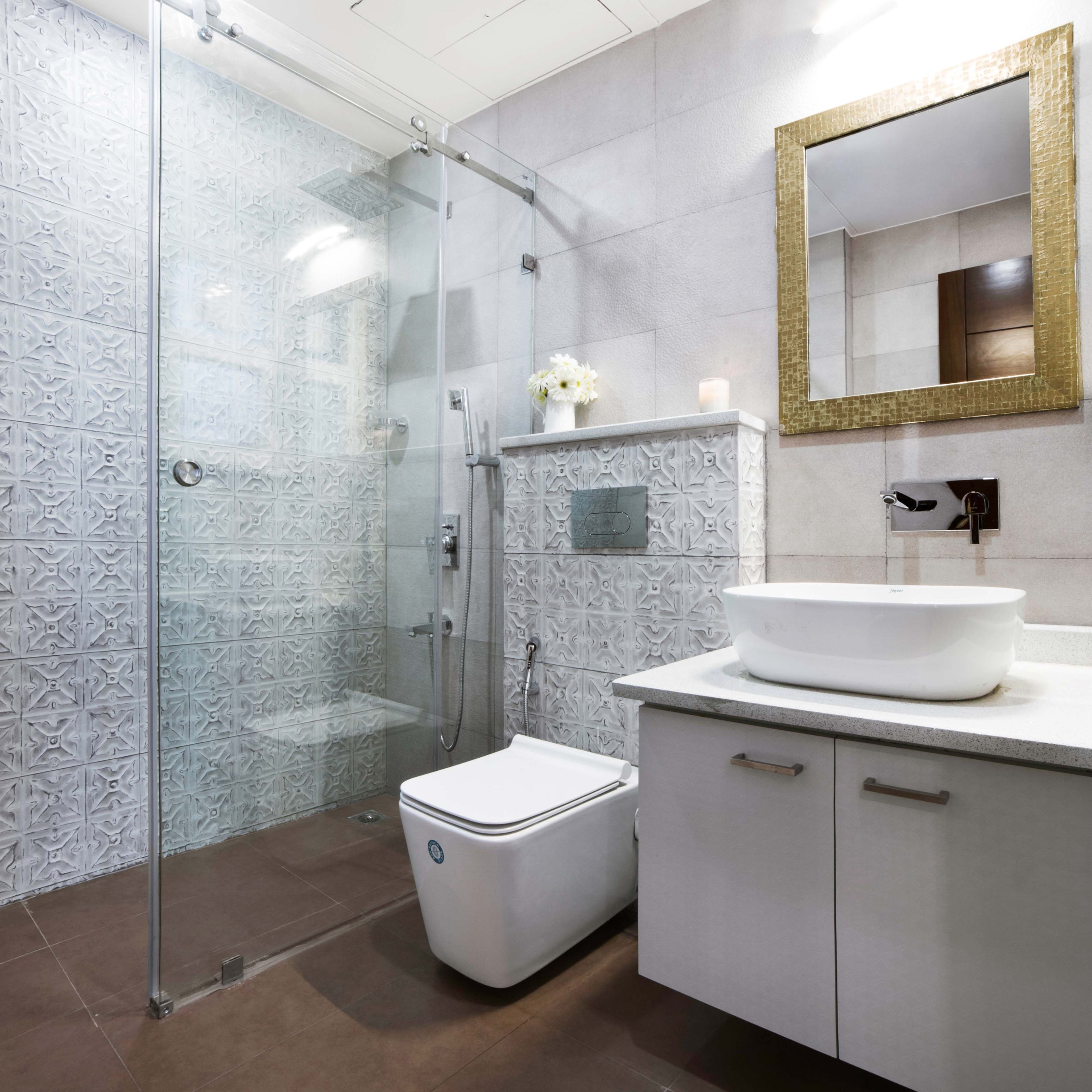 Modern Bathroom Design With A Golden-Framed Mirror