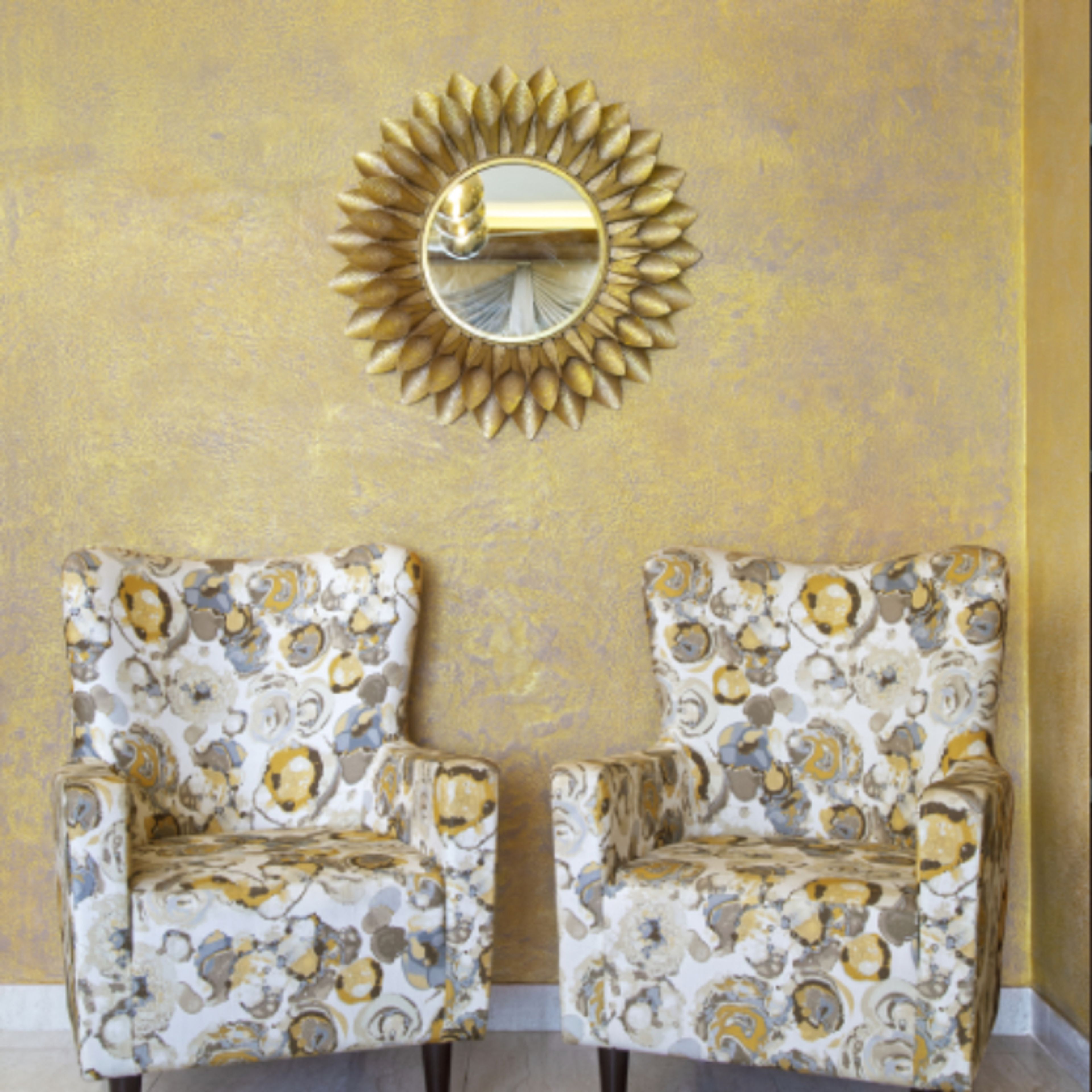 Classic Gold Foyer Design With Patterned Accent Chairs