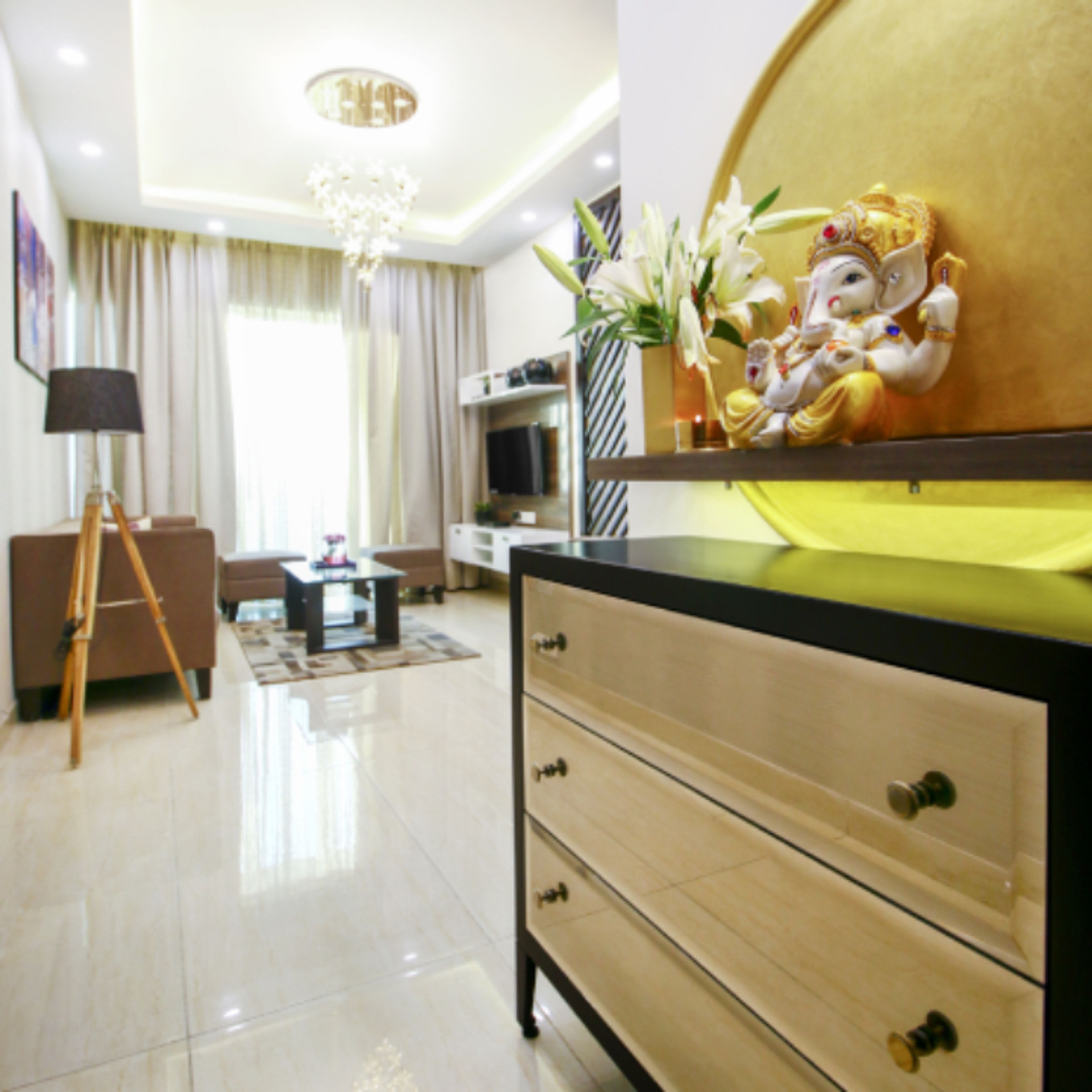Modern Cream Toned Foyer Design With Wooden Sideboard