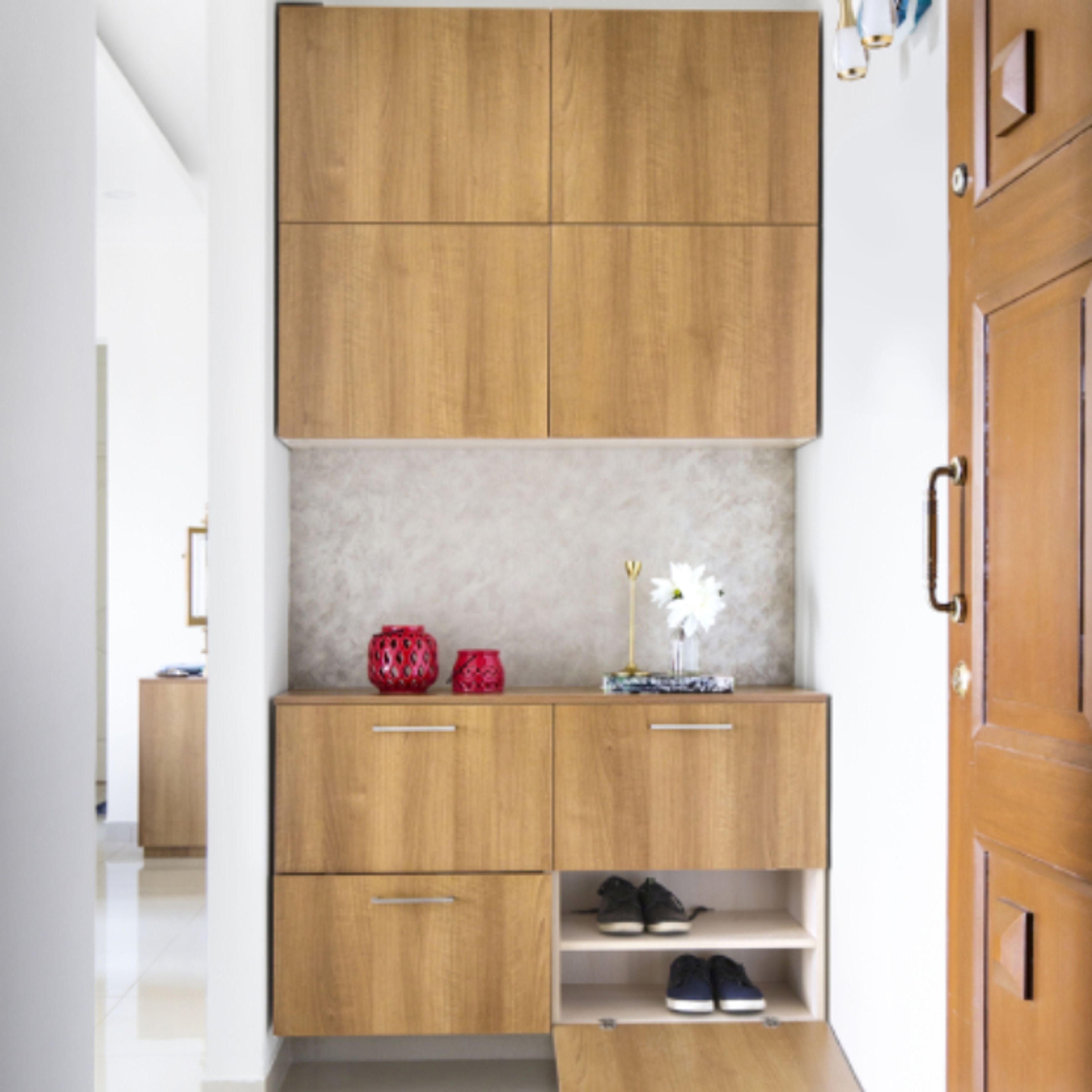 Modern Wooden Foyer Design With Wall-Mounted And Overhead Cabinets