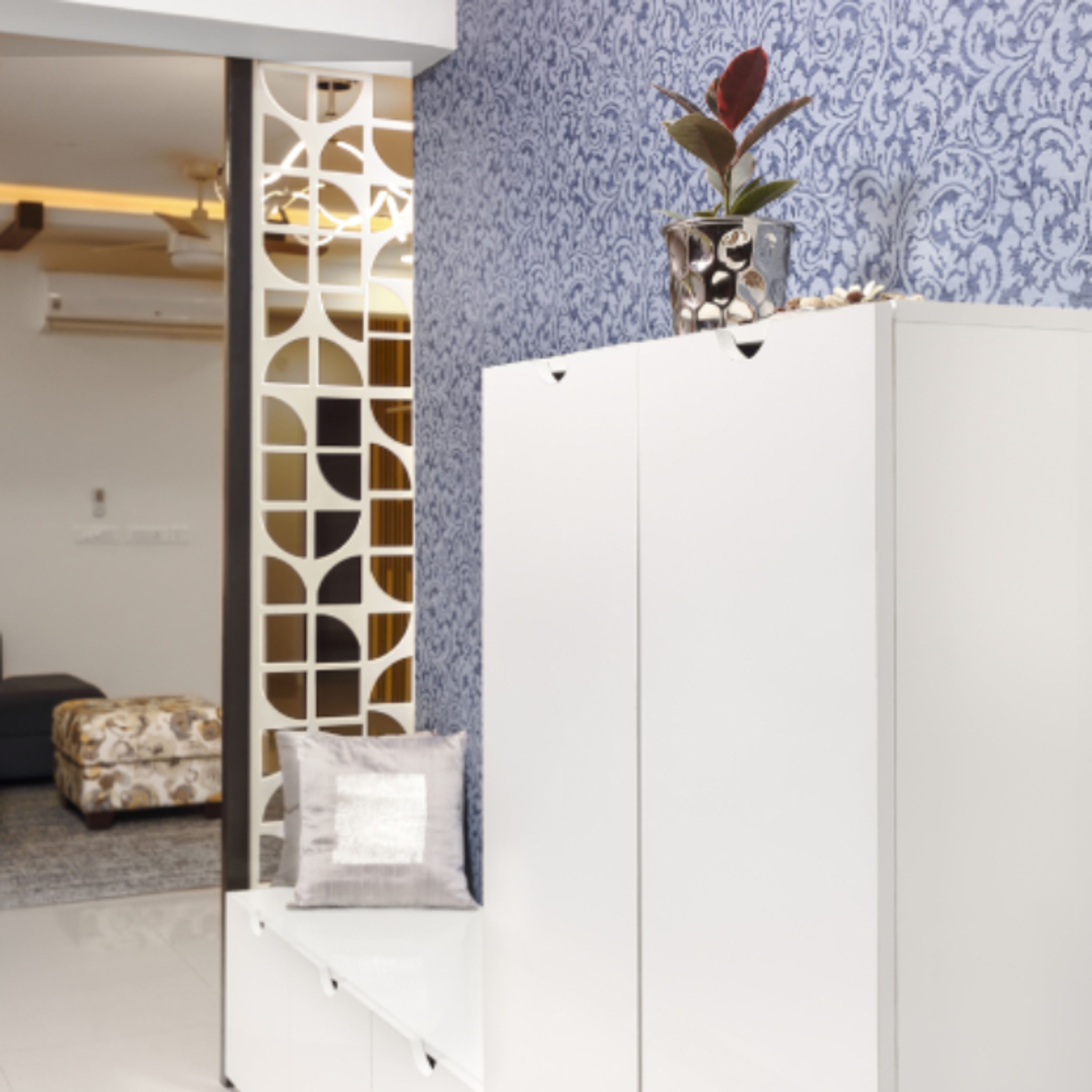 Modern Foyer Design With Two-Stepped White Storage