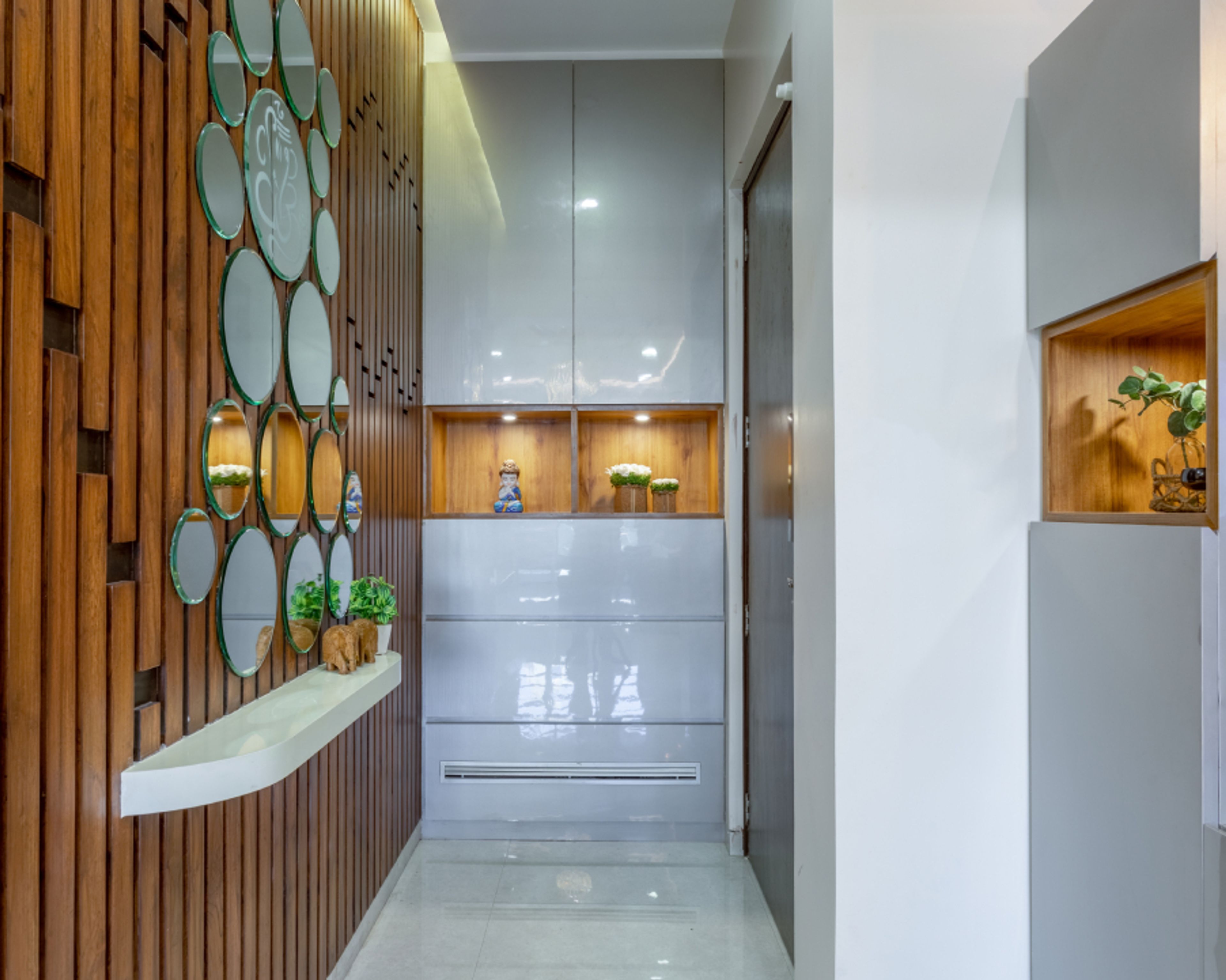 Modern White Foyer Design With A Glossy Finish