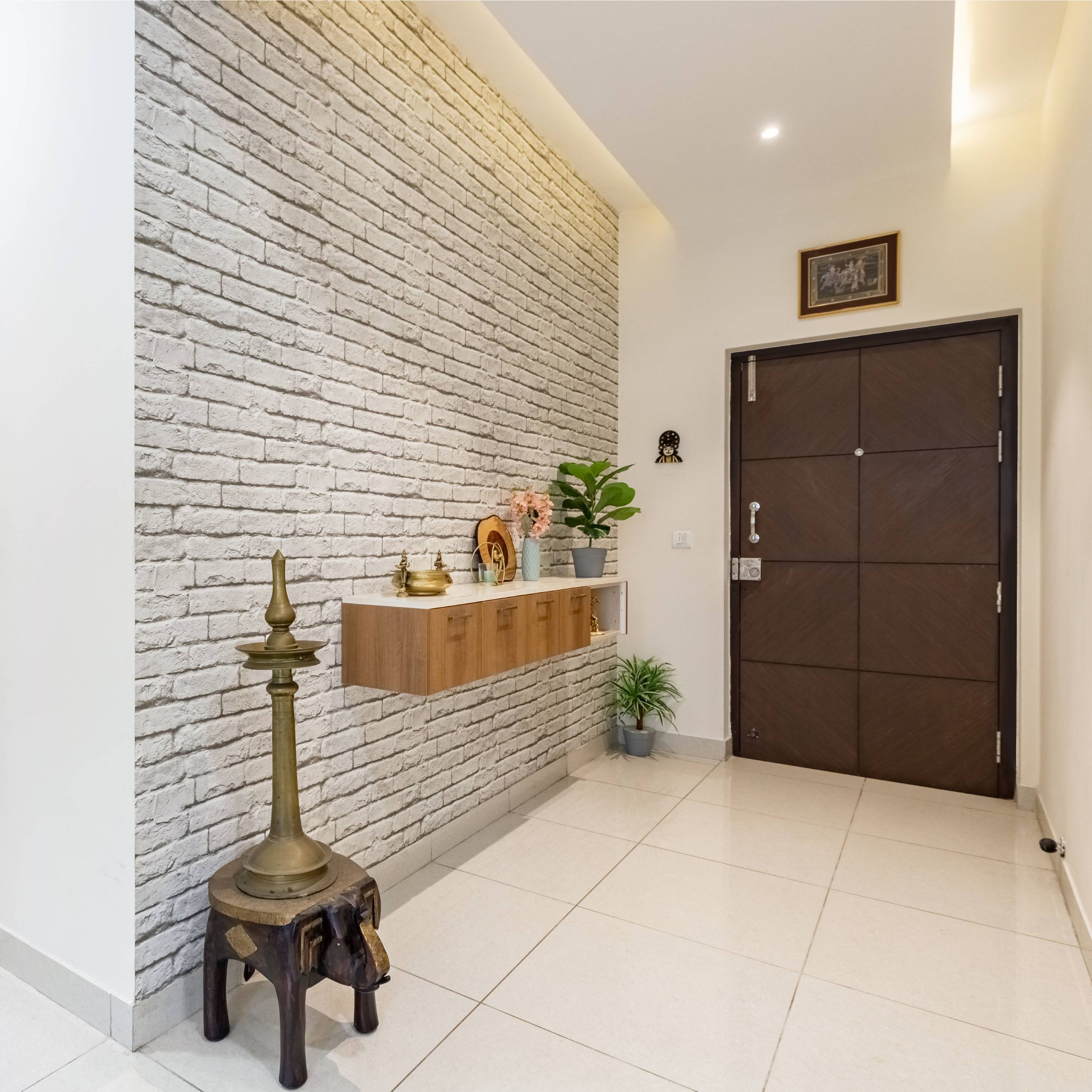 Contemporary Foyer Design With Accent White Brick Wall