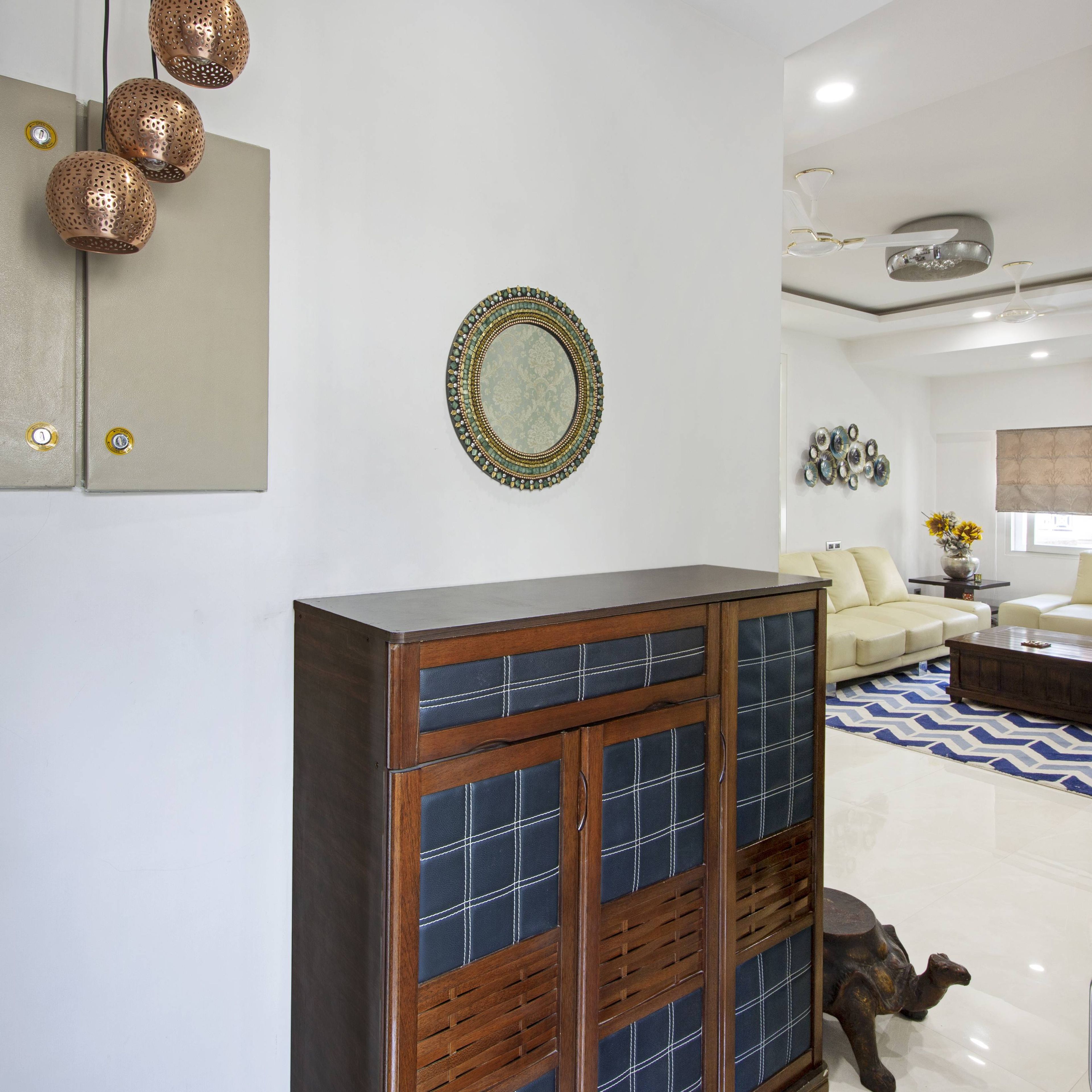 Classic Foyer Design With Wood And Blue Upholstery