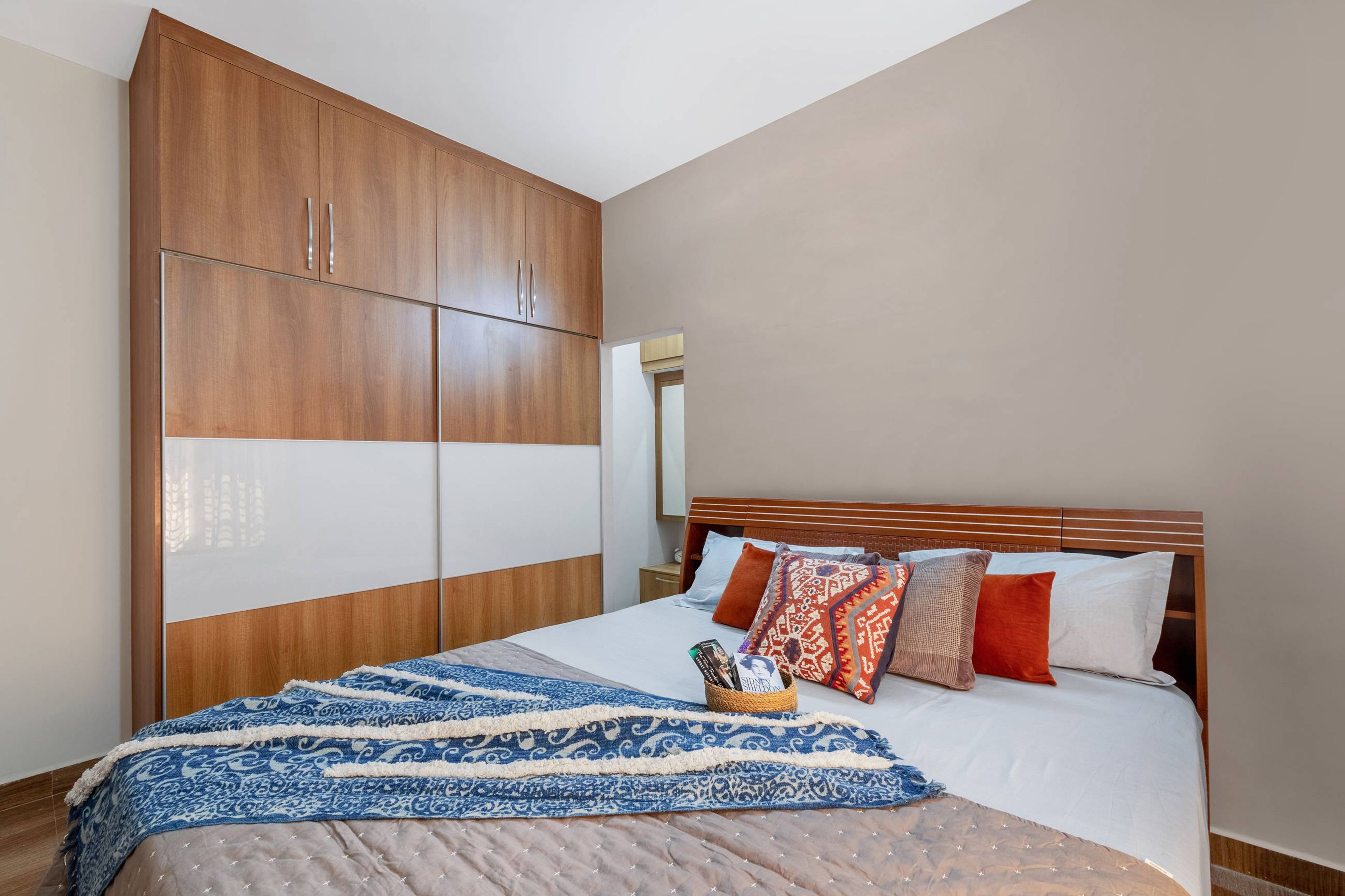 Modern Guest Bedroom Design With Beige Accent Wall