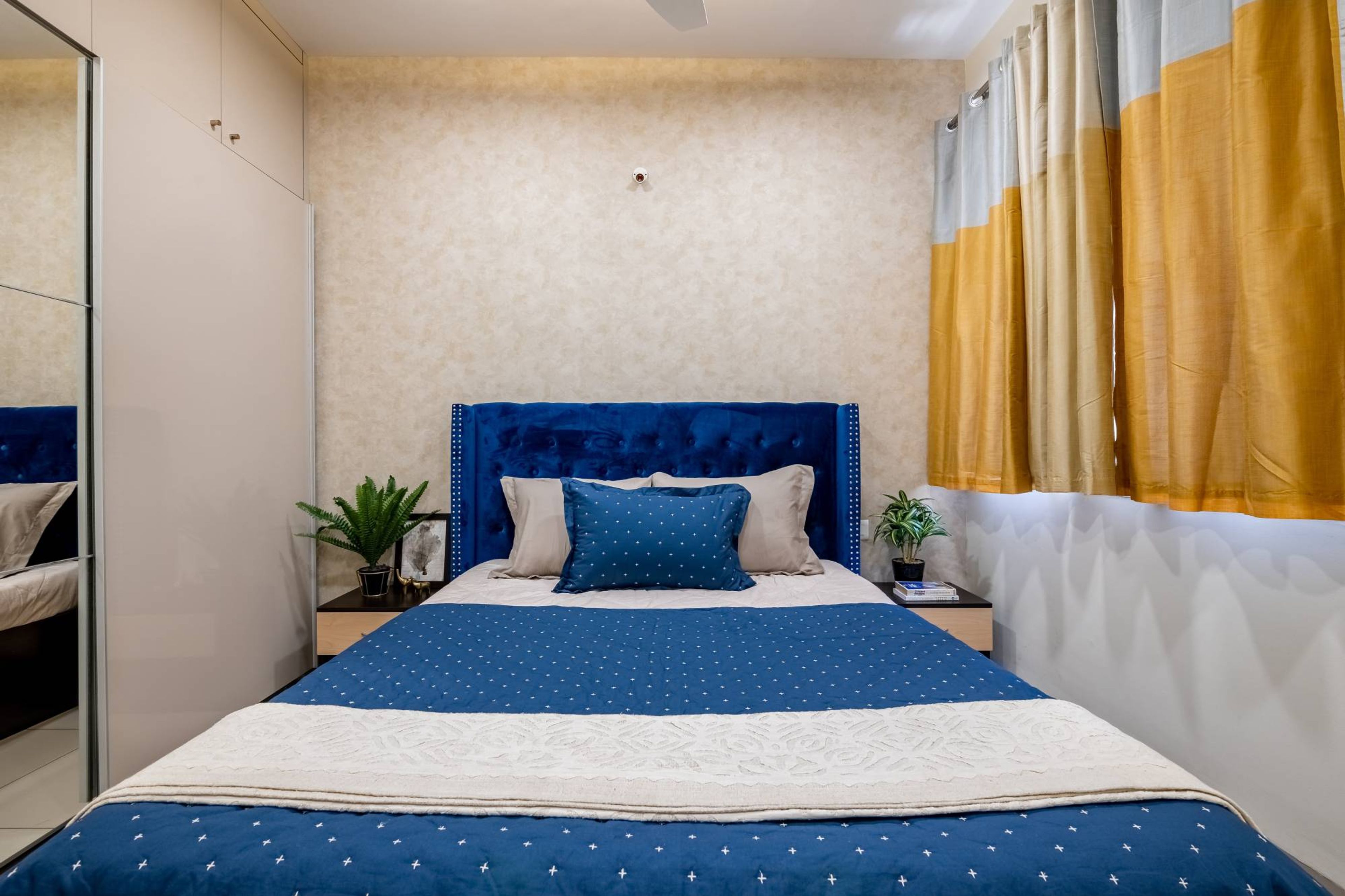 Modern Guest Bedroom Design With Blue And White Upholstery