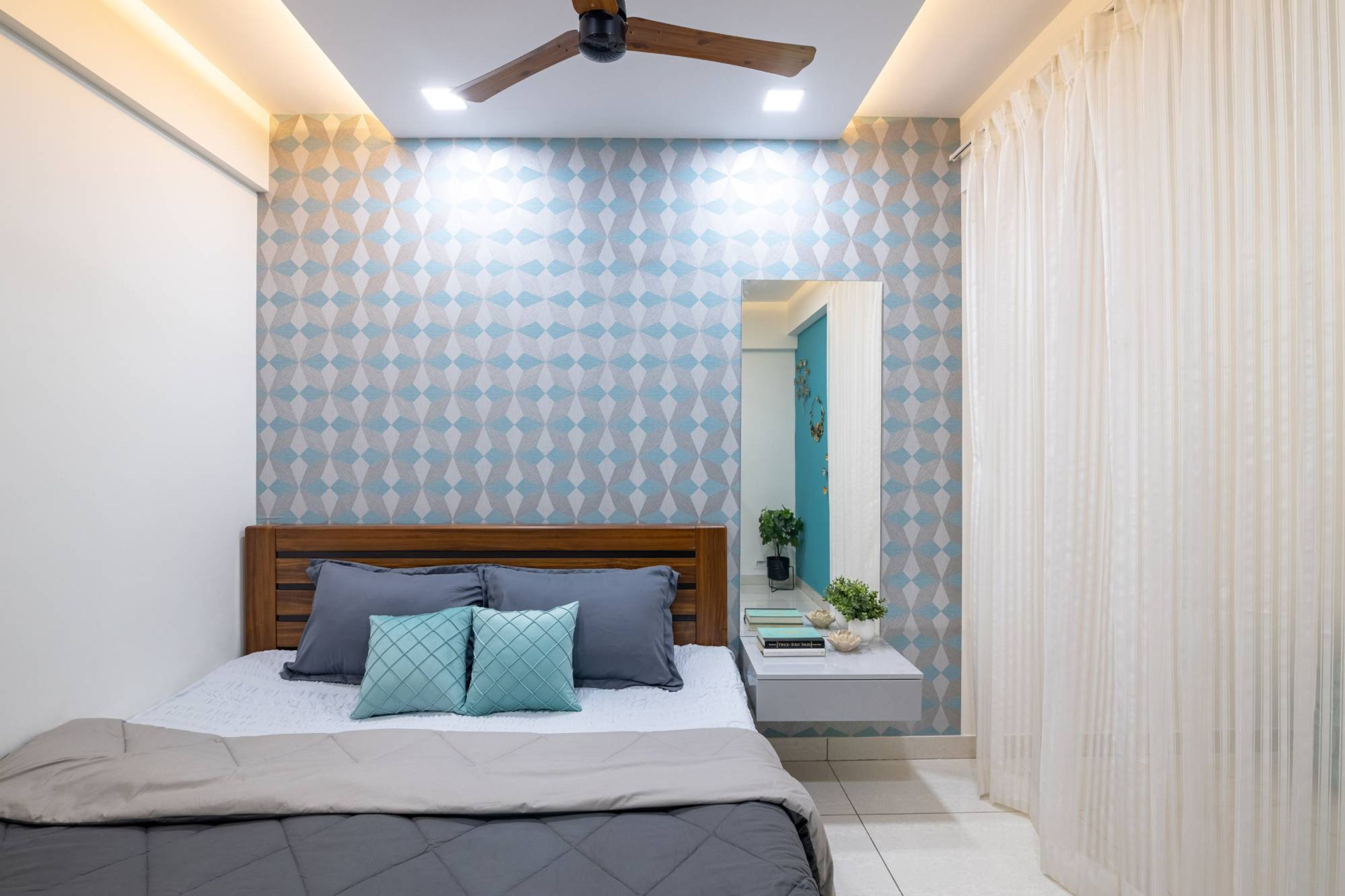 Modern Guest Bedroom Design With Blue Patterned Wallpaper
