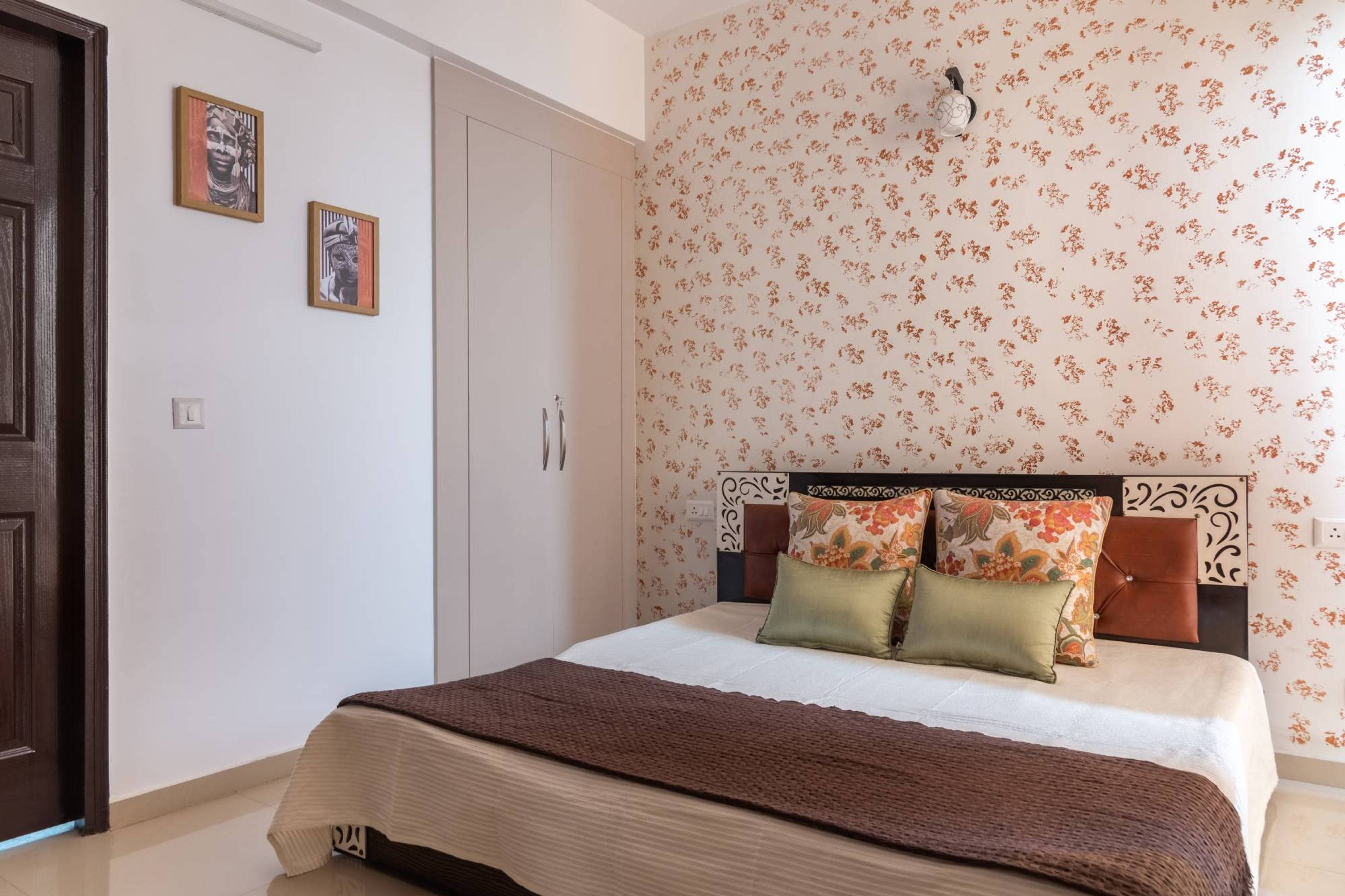 Modern Guest Bedroom Design With Pink Floral Wallpaper