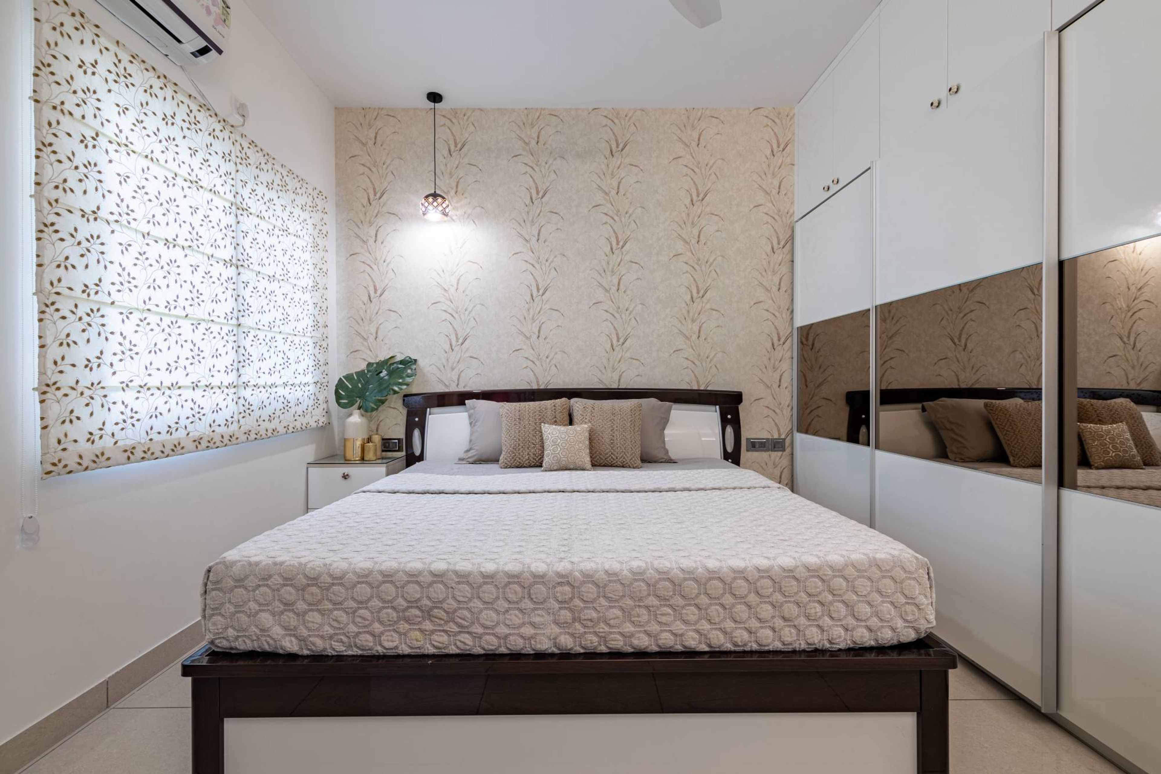 Modern Guest Bedroom Design With White Mirrored Wardrobe