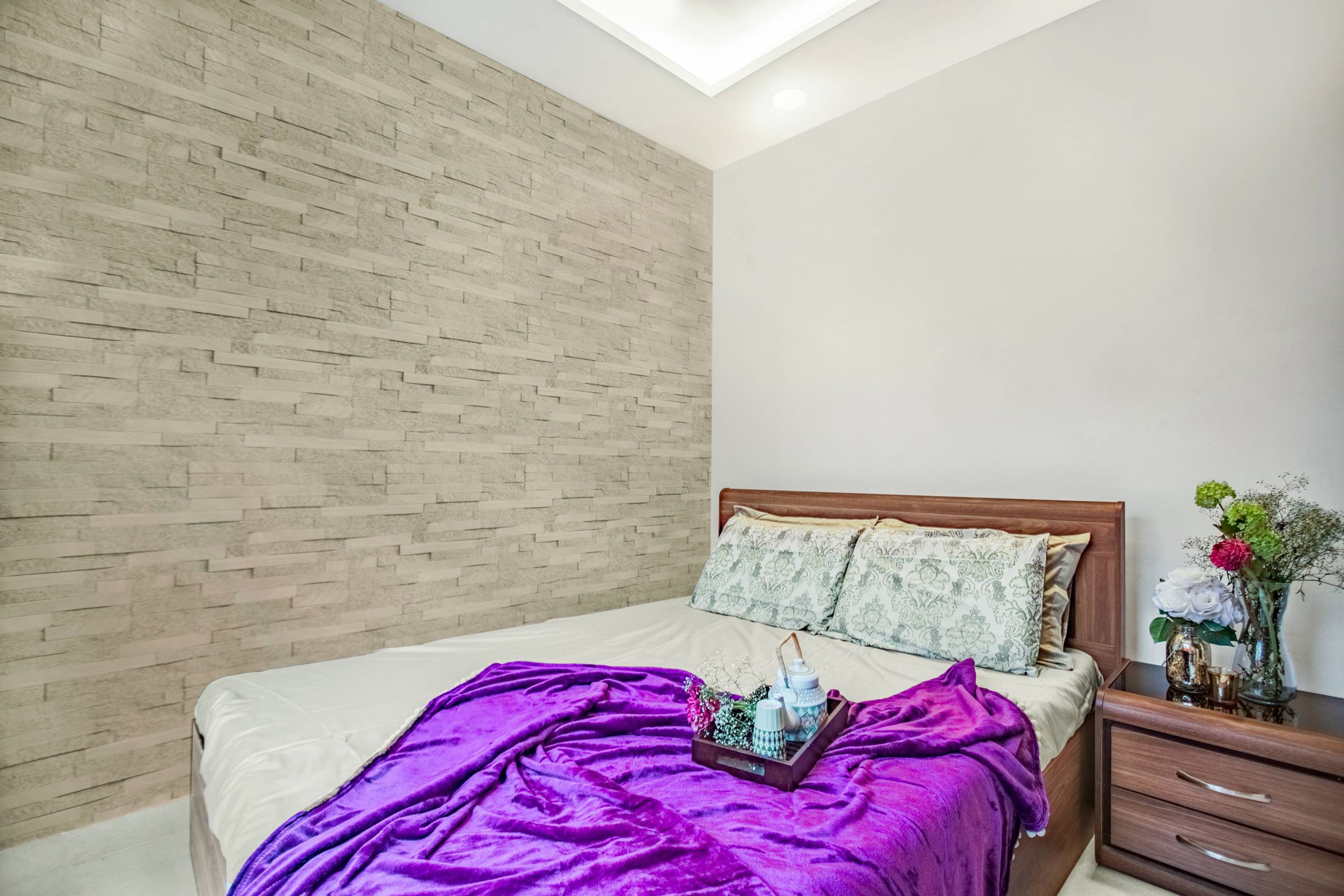 Modern Guest Room Design With Walnut-Toned Headboard