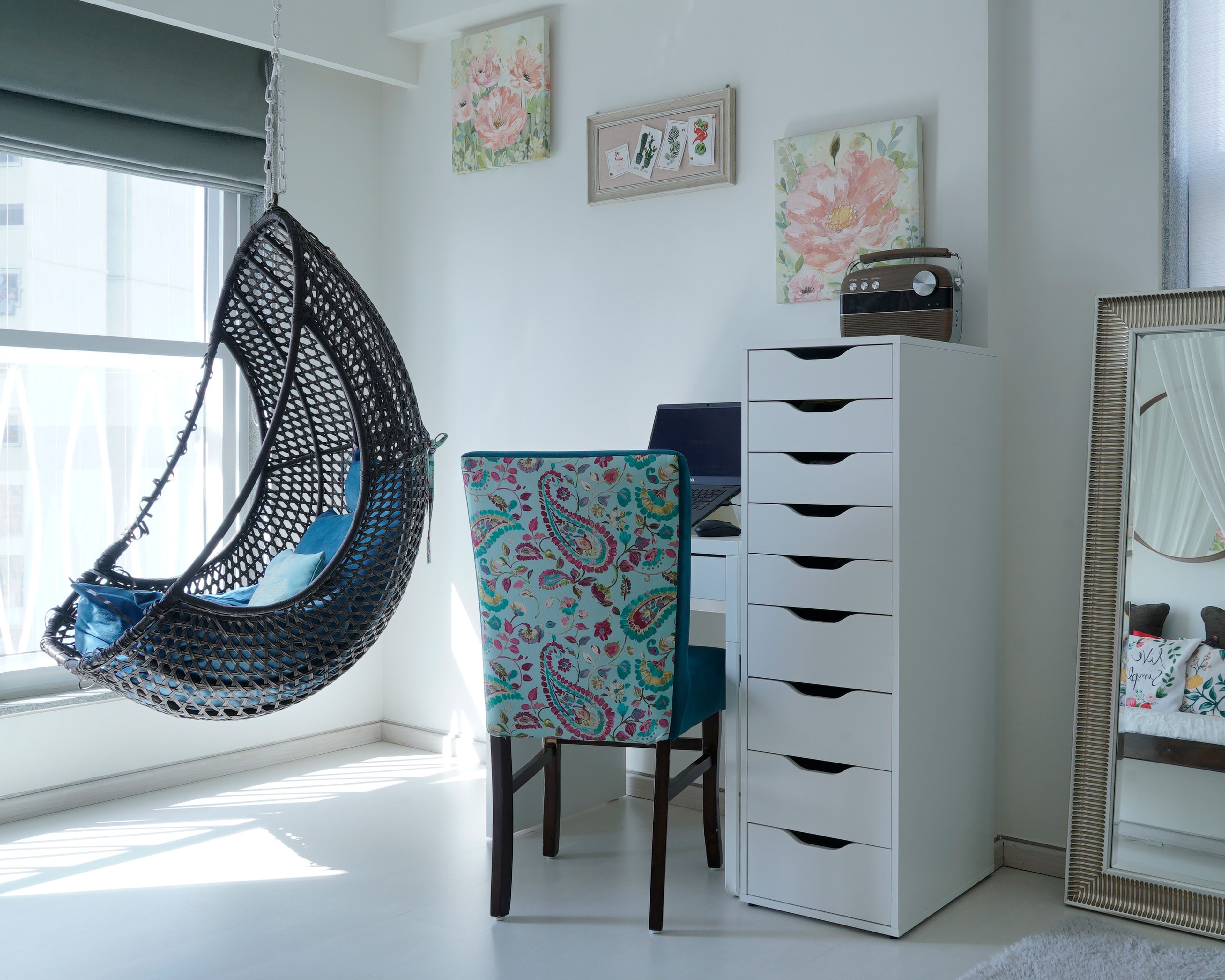 Modern Home Office Design With A Tall Storage Unit With Drawers