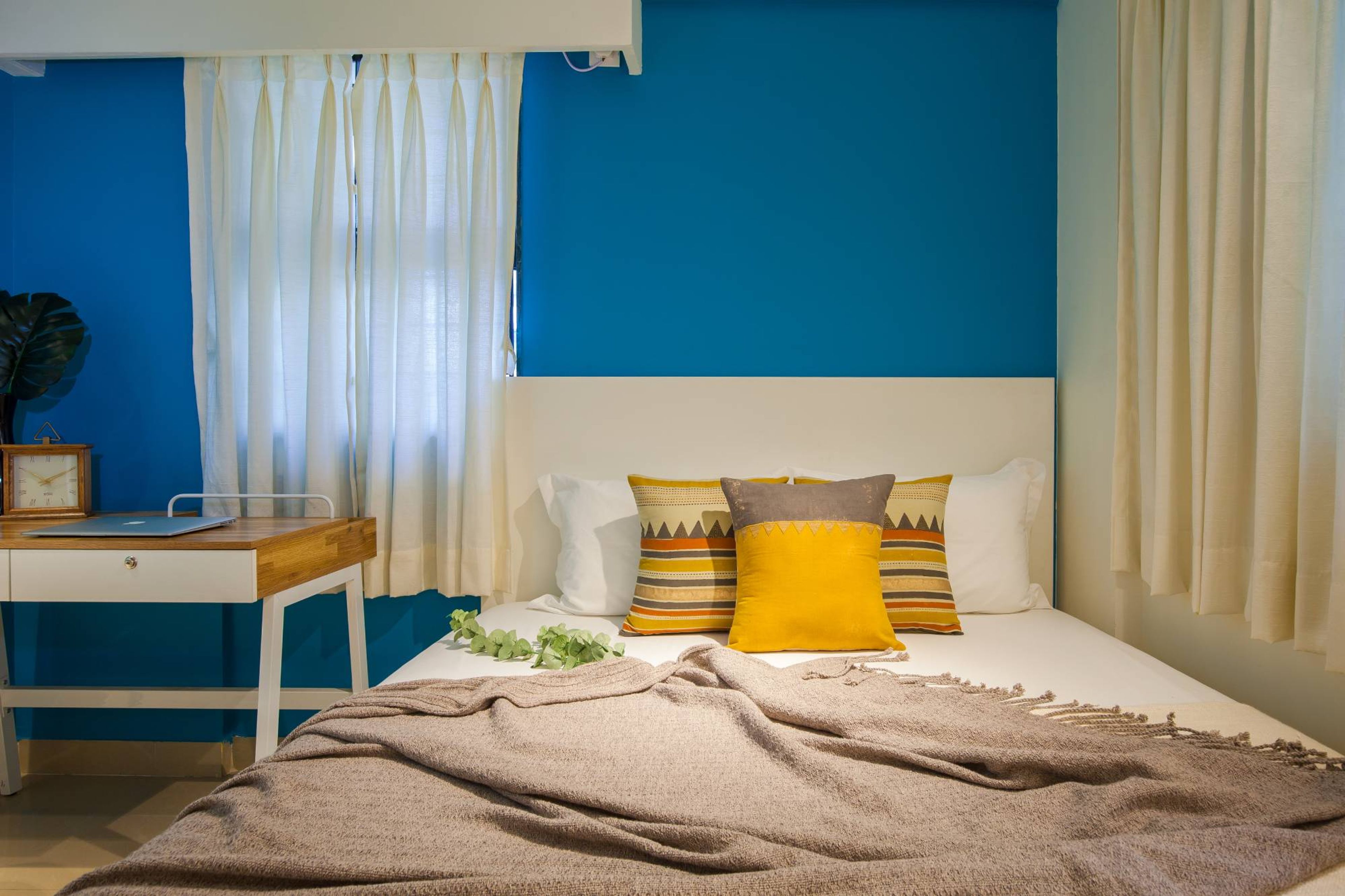 Modern Kids Room Design With A Study Desk And Track Lights