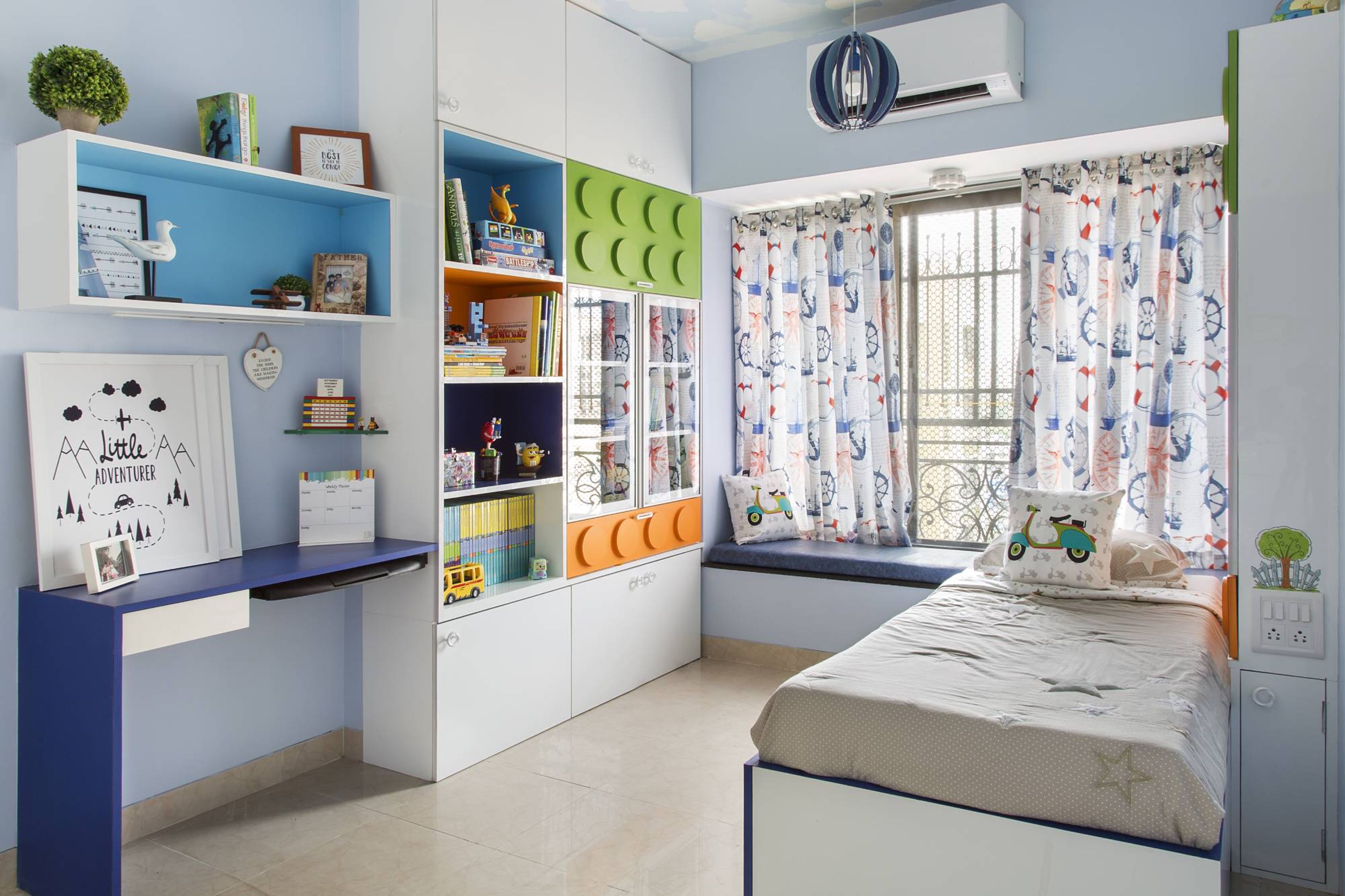 Modern Kids Room Design With A White Bed And Spacious Storage Unit
