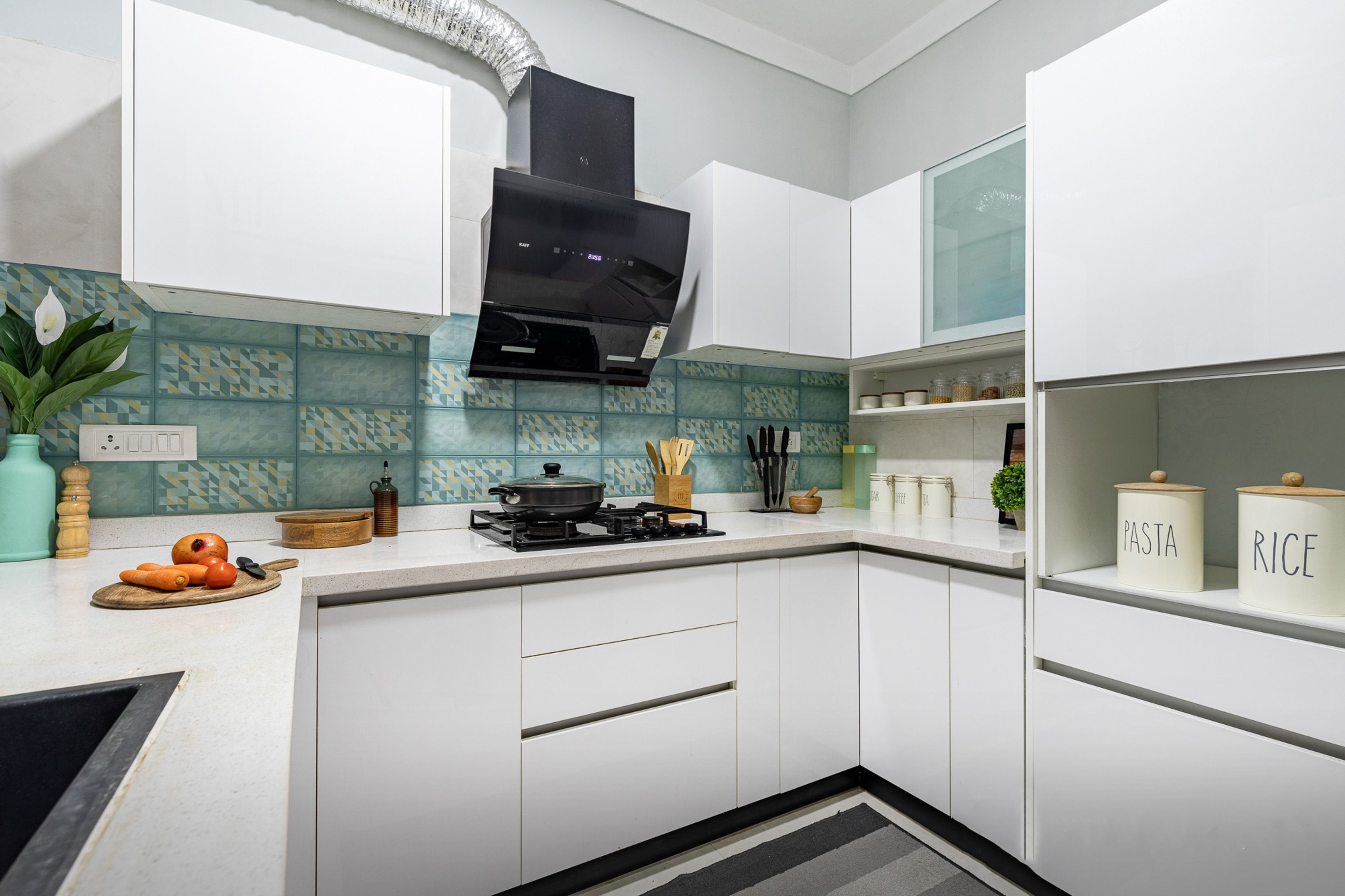 U-Shaped Light-Coloured Modern Kitchen Design With A Quartz Countertop