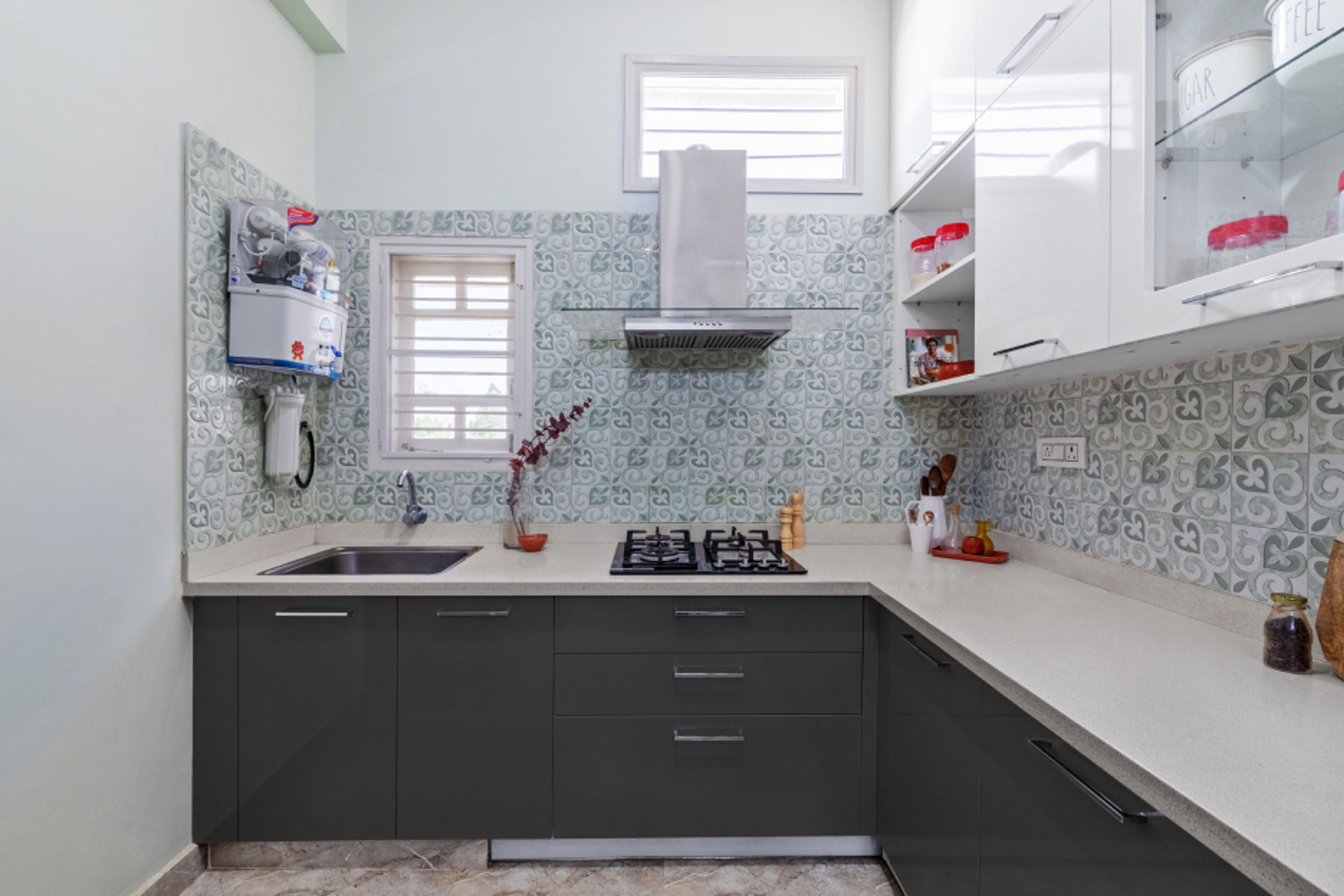 Modern L-Shaped Kitchen Design With A Corian Countertop