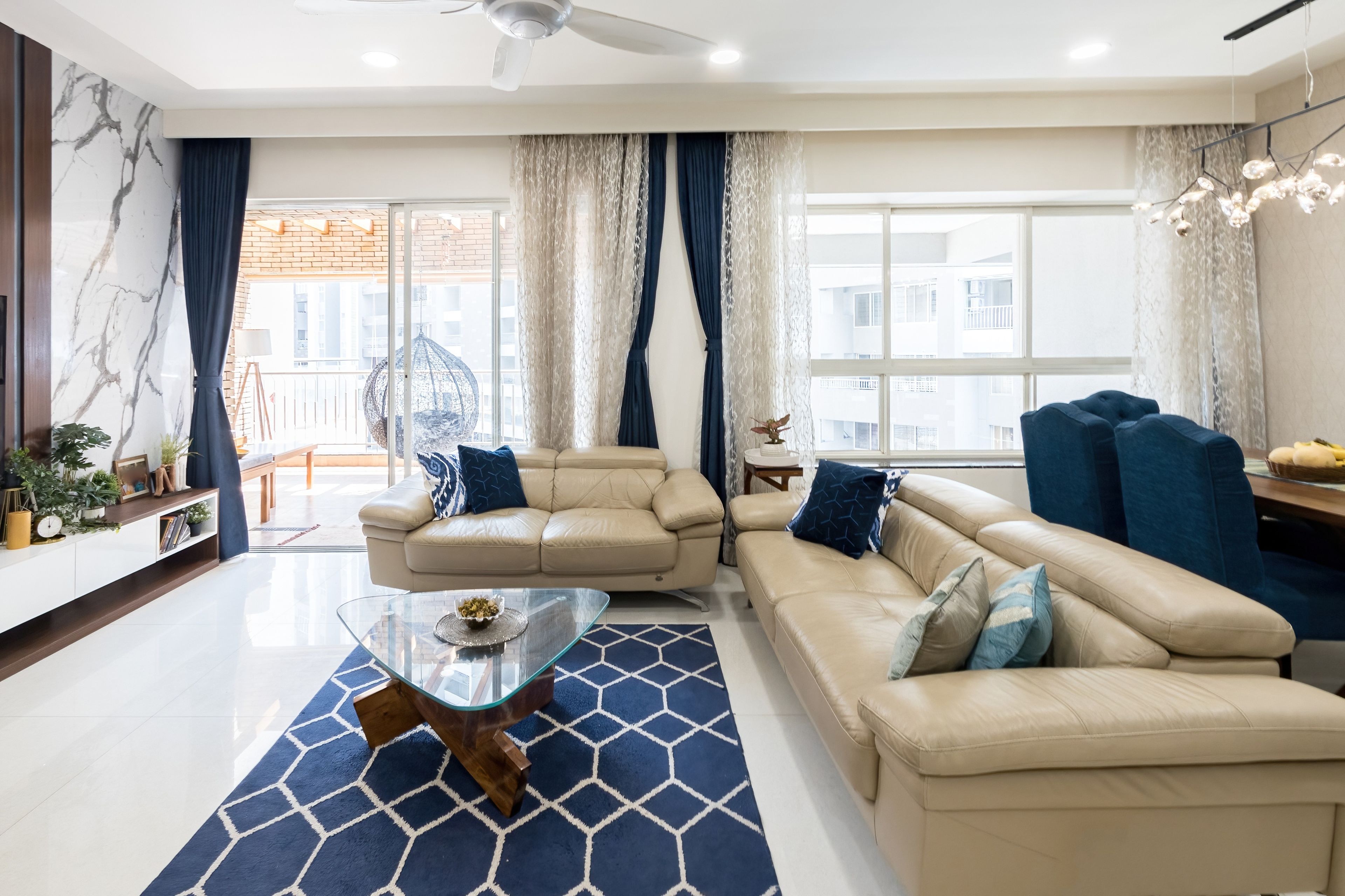 Living Room With White Leather Sofa - Livspace