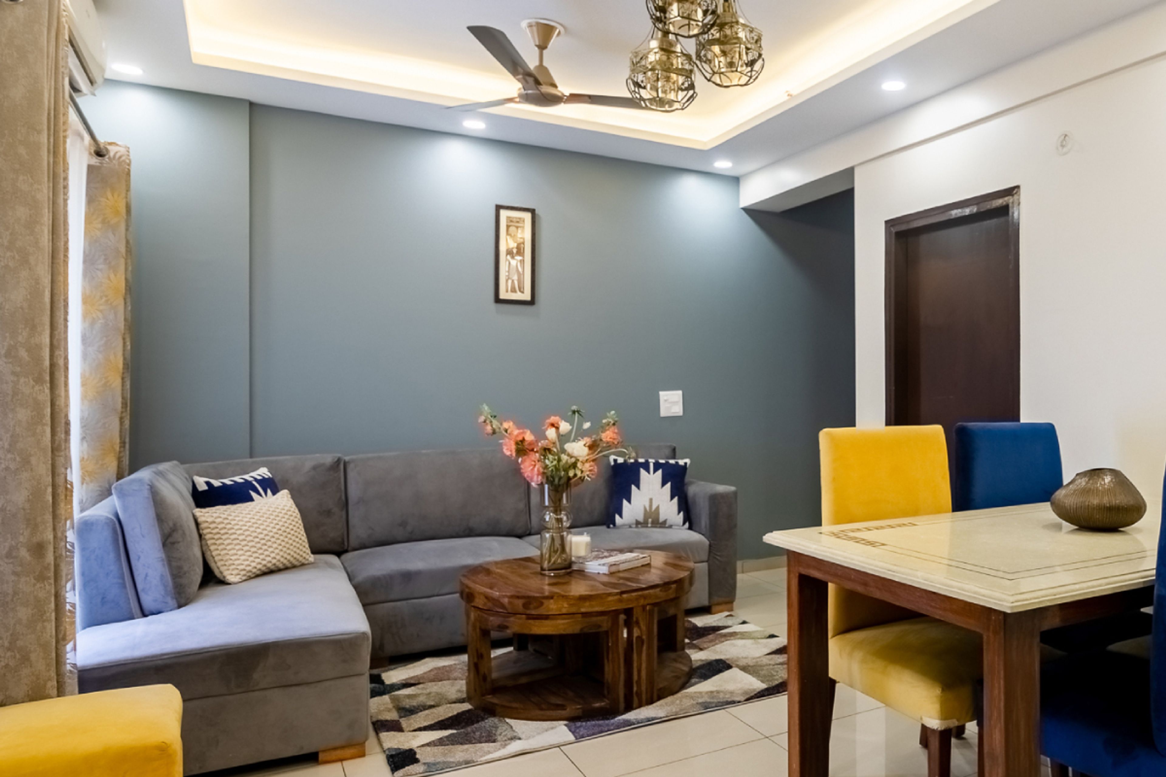 Living Room With A Wooden Table - Livspace