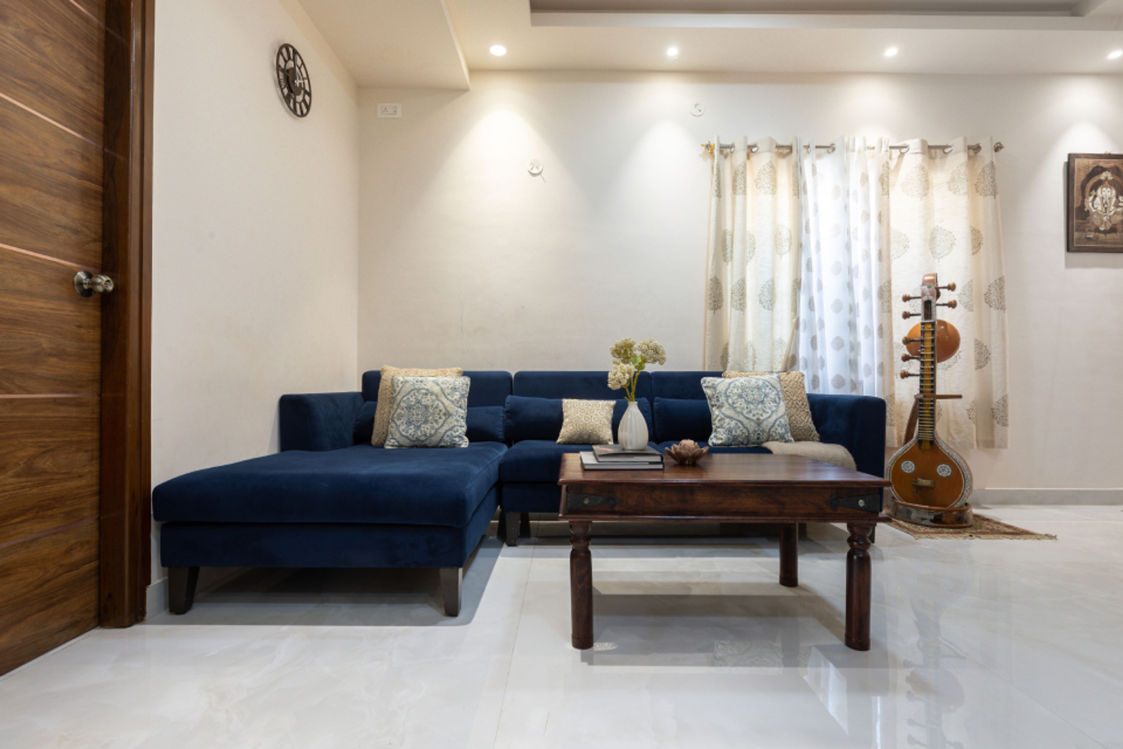 Traditional Living Room Design In Shades Of White And Blue