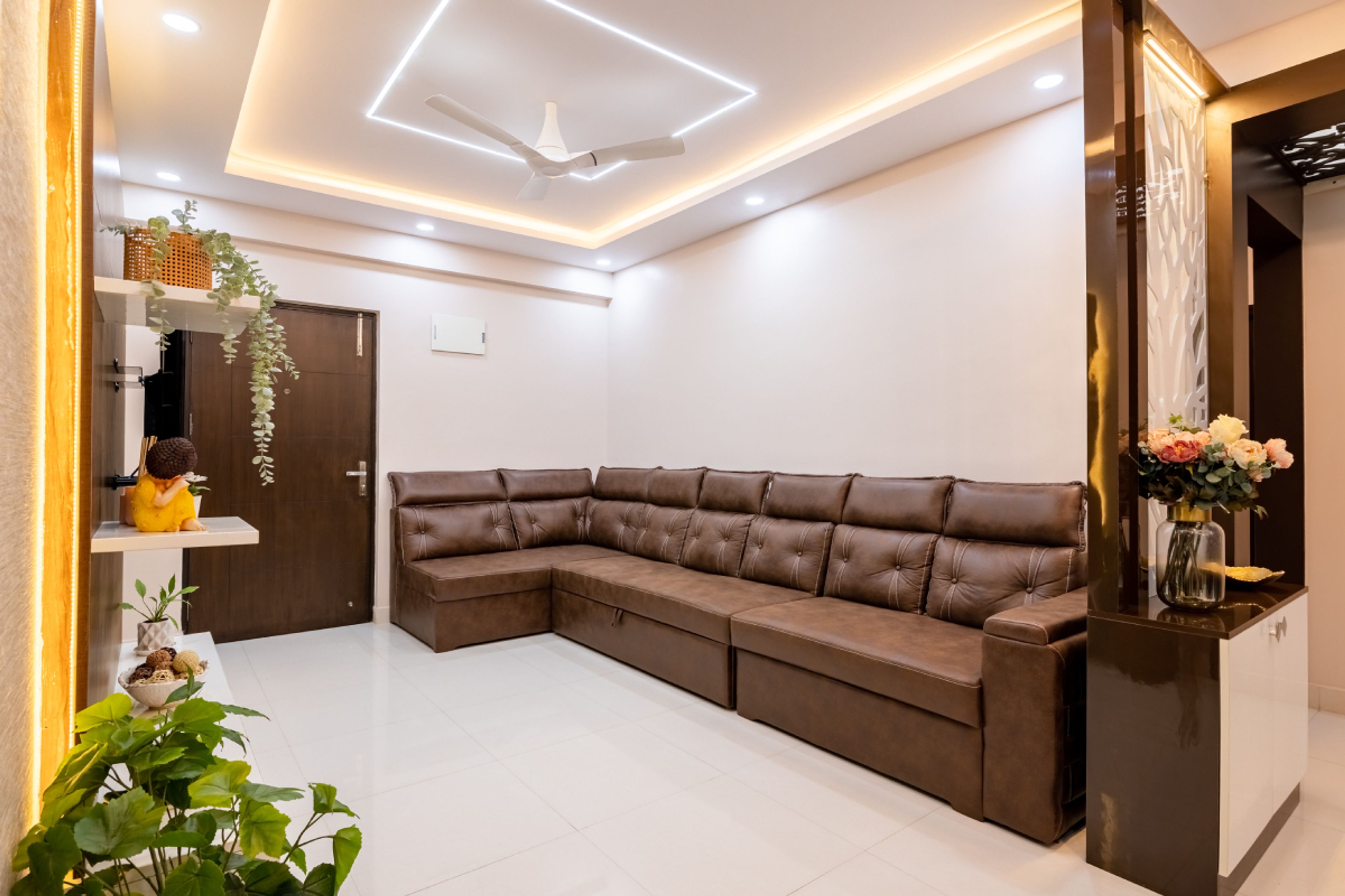 Modern Living Room Design With A 6-Seater Brown Sofa