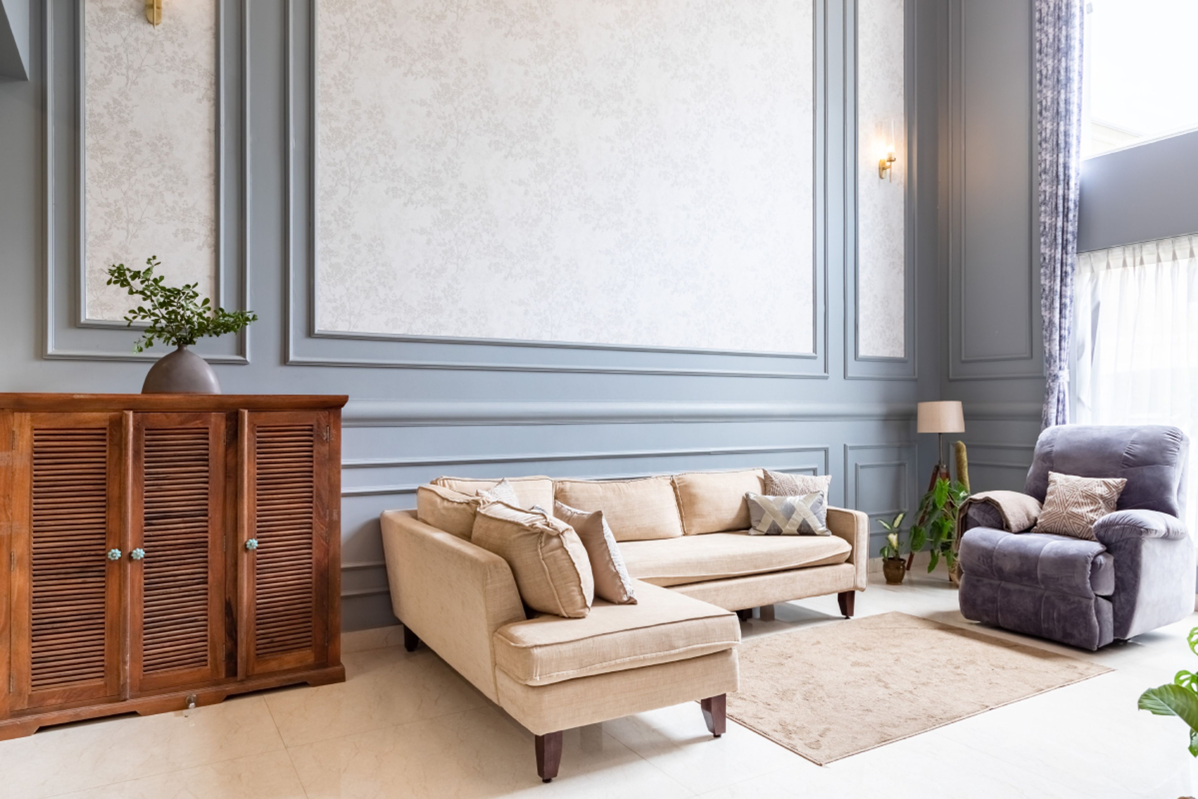 Spacious Living Room With 3-Deater Sofa And Grey Upholstered Recliner - Livspace