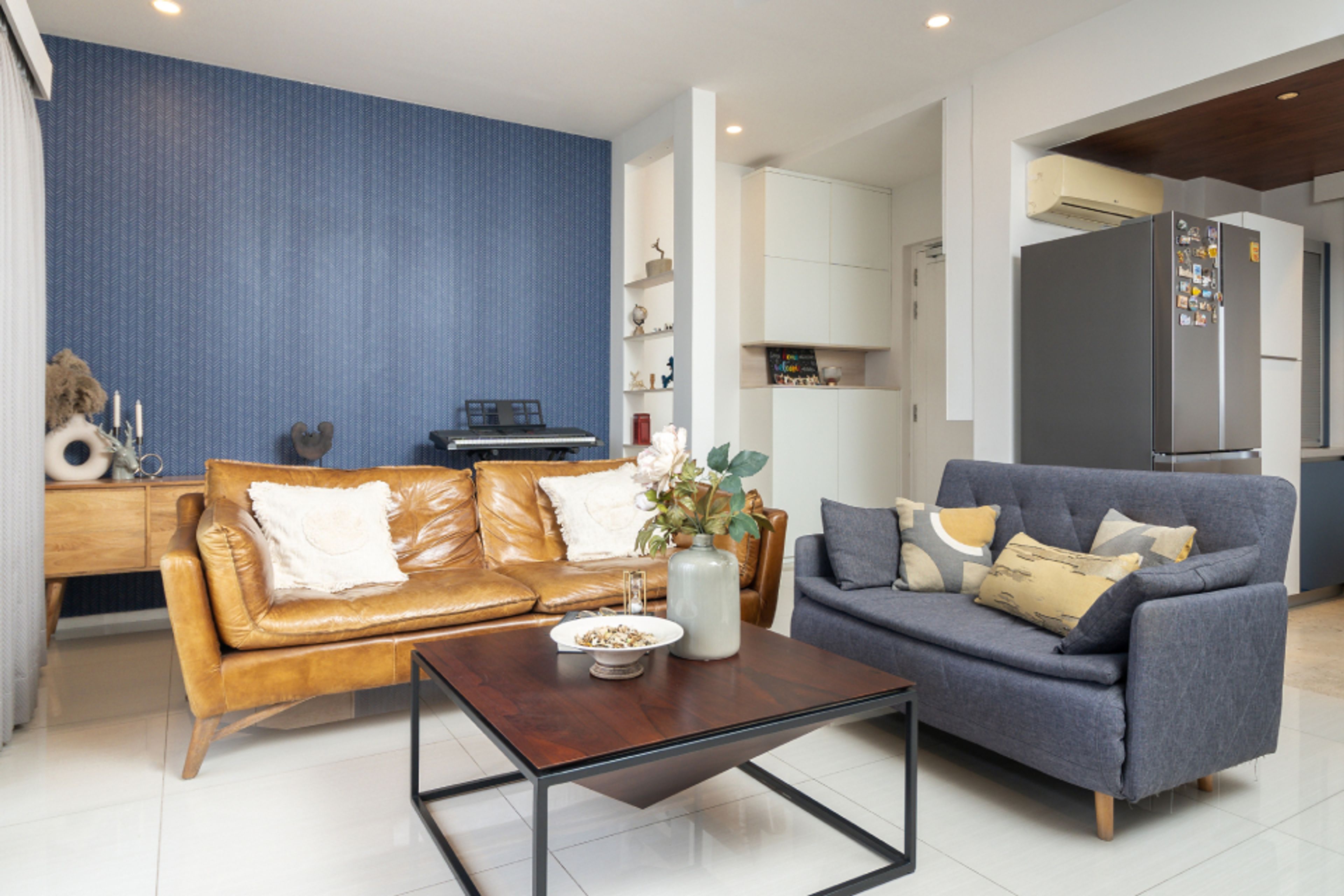 Living Room Design With Upholstered Seating And A Rectangular Center Table - Livspace