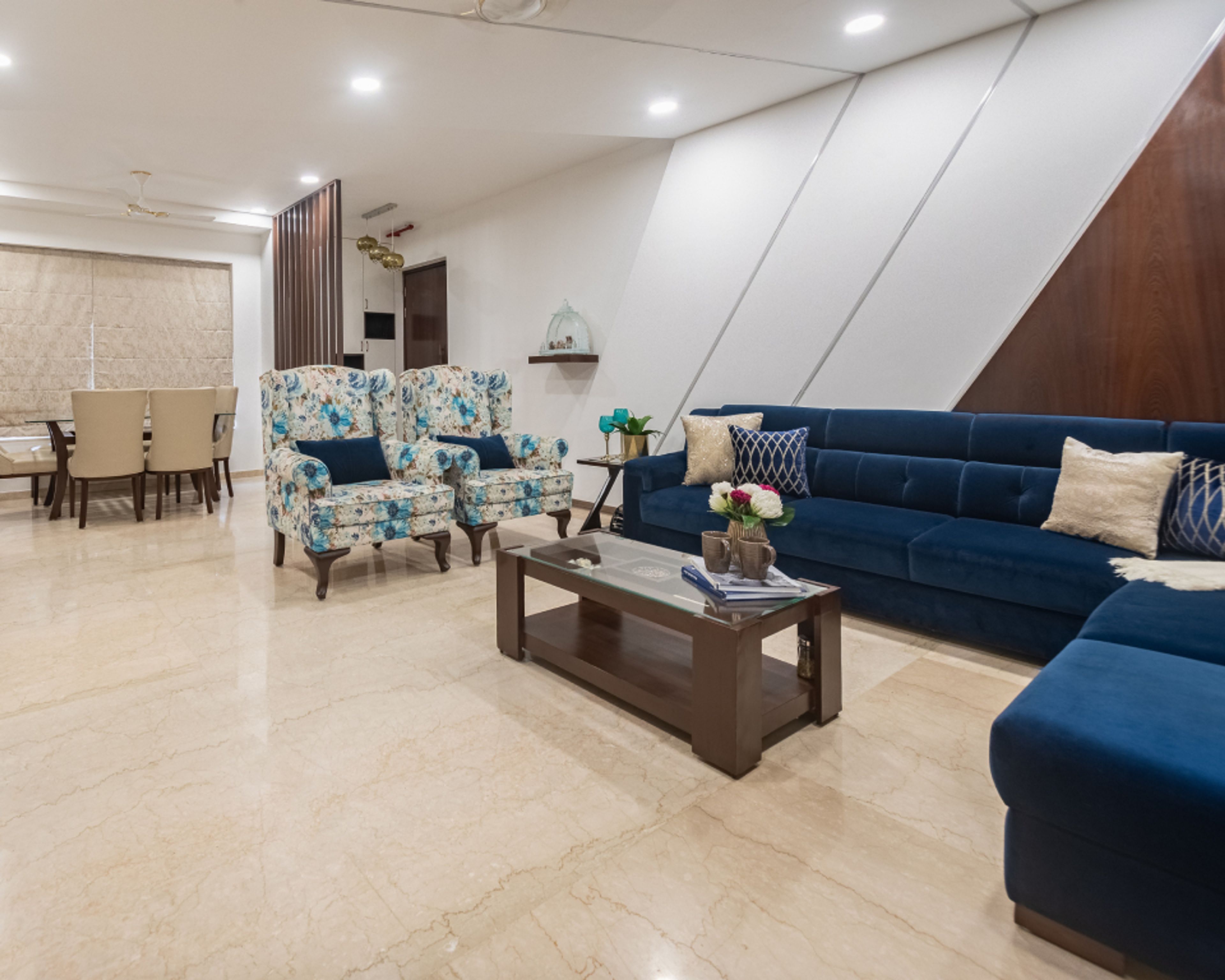 Contemporary Living Room Design With Cream And Blue Seating