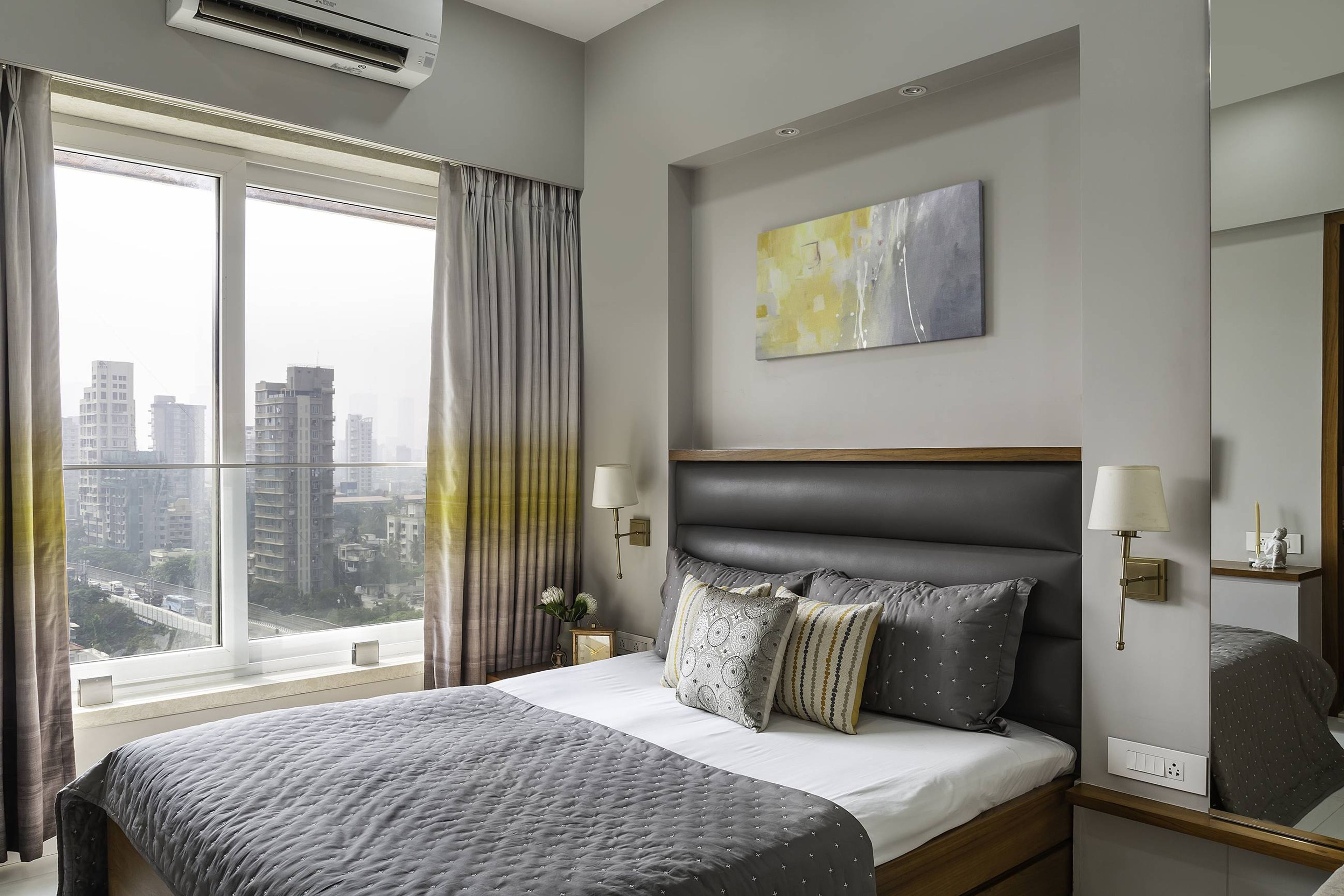 Modern Bedroom Design With A King Size Bed And Grey Wall Paint