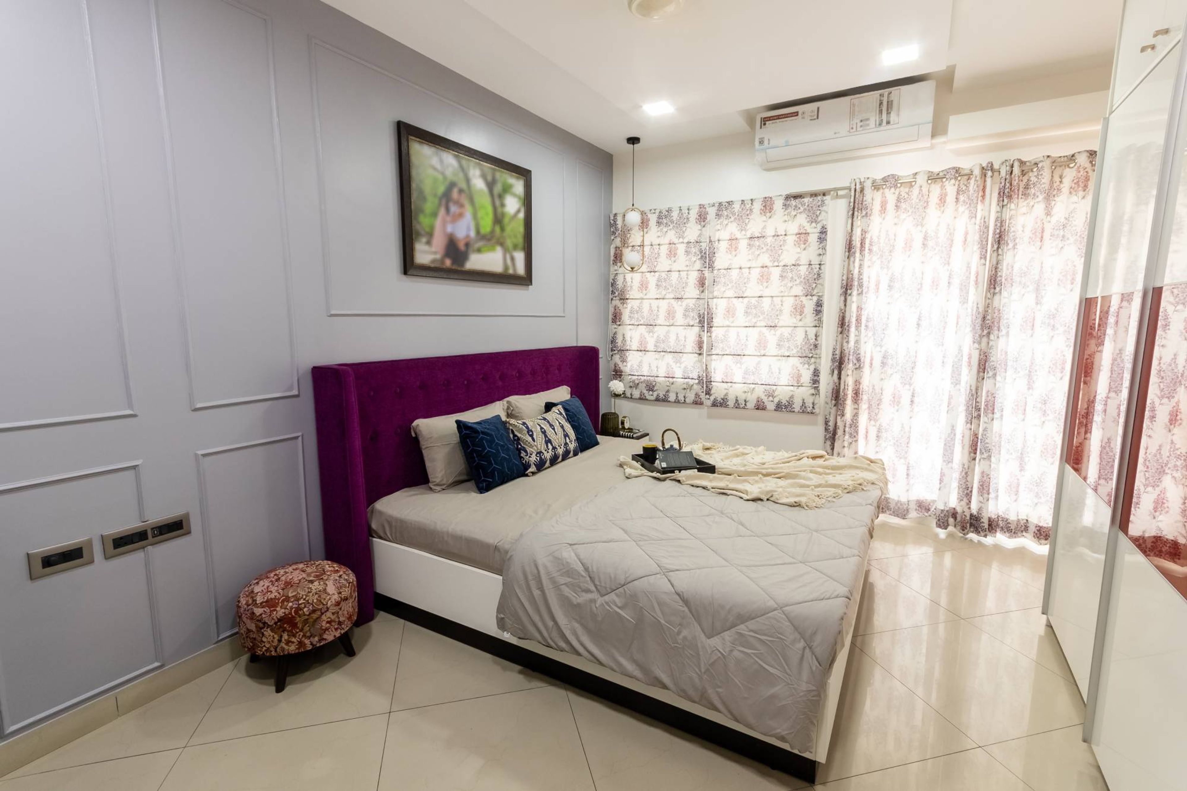 Bedroom Design With A King Size Bed And Wall-Mounted Storage - Livspace