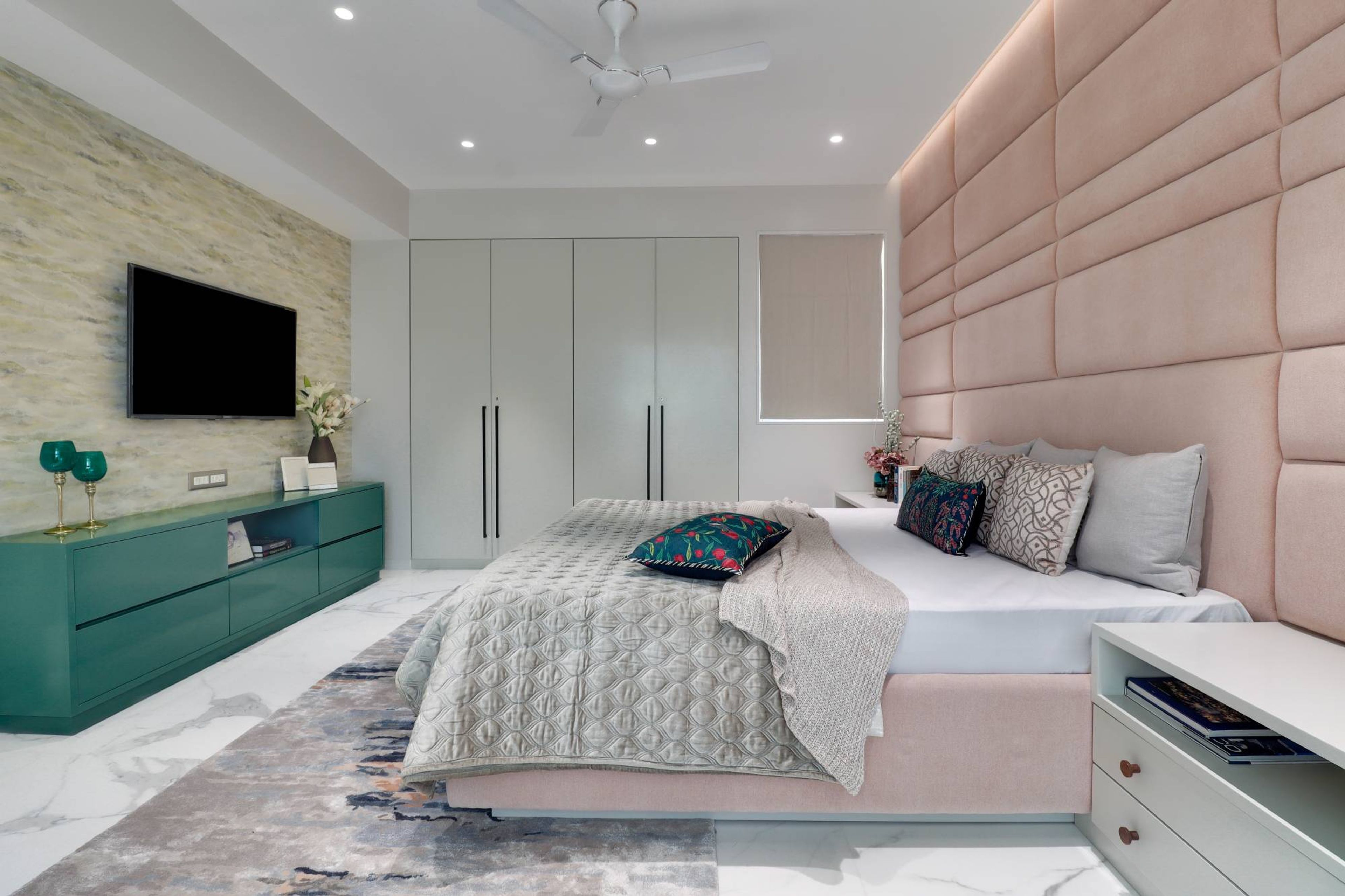 Bedroom Design With A Double Bed And A TV Unit - Livspace