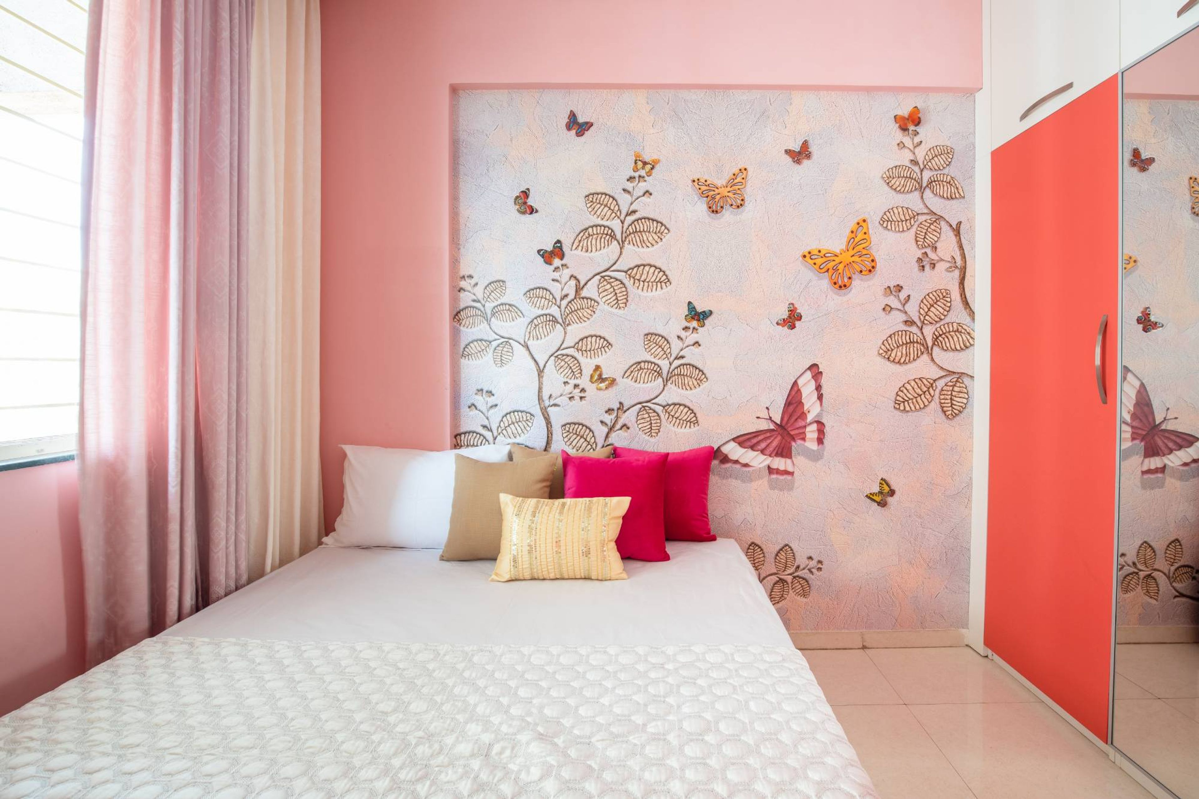 Bedroom Design With Peach Walls And Natural Lighting - Livspace