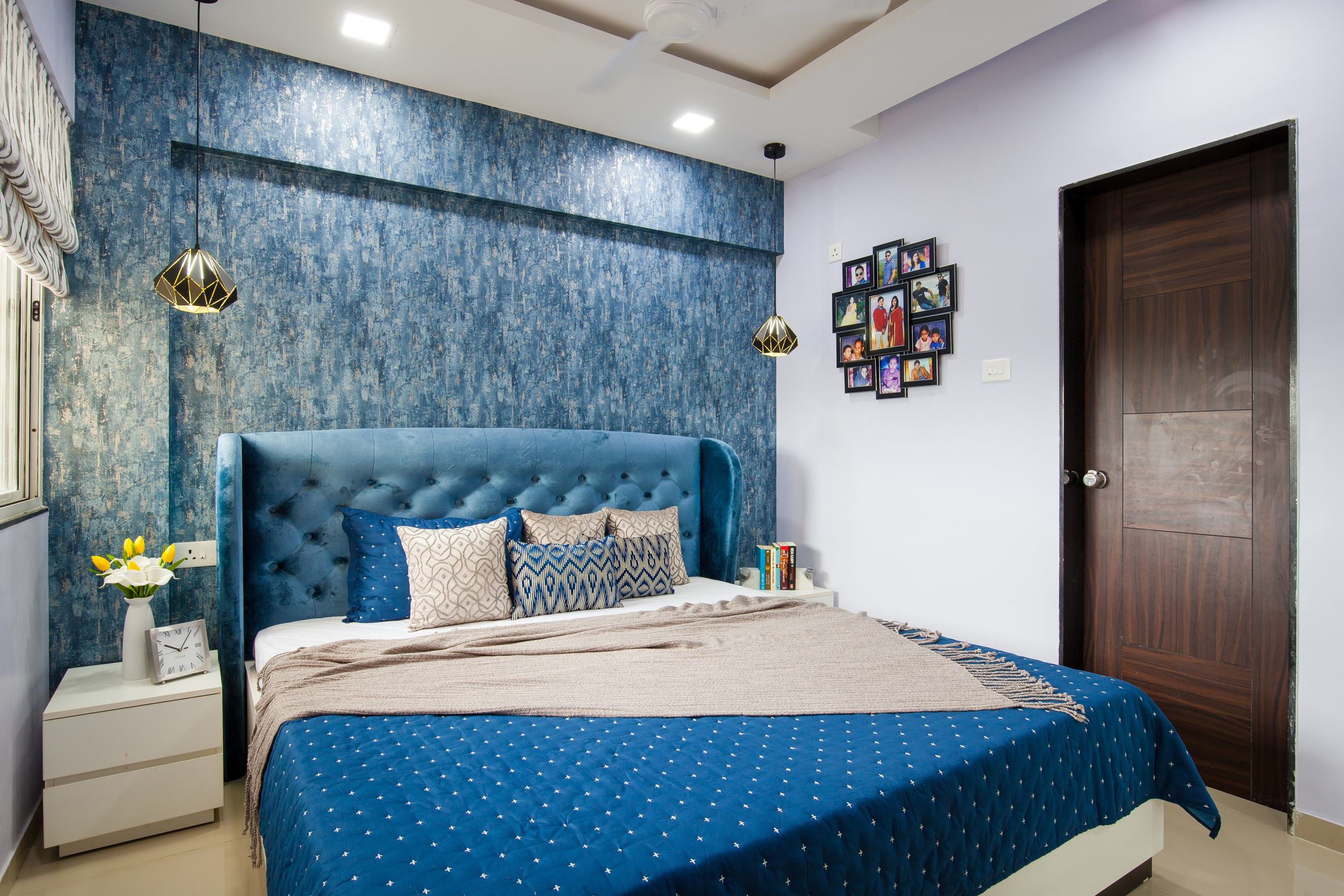 Master Bedroom Design With Blue Bed And White Side Tables - Livspace