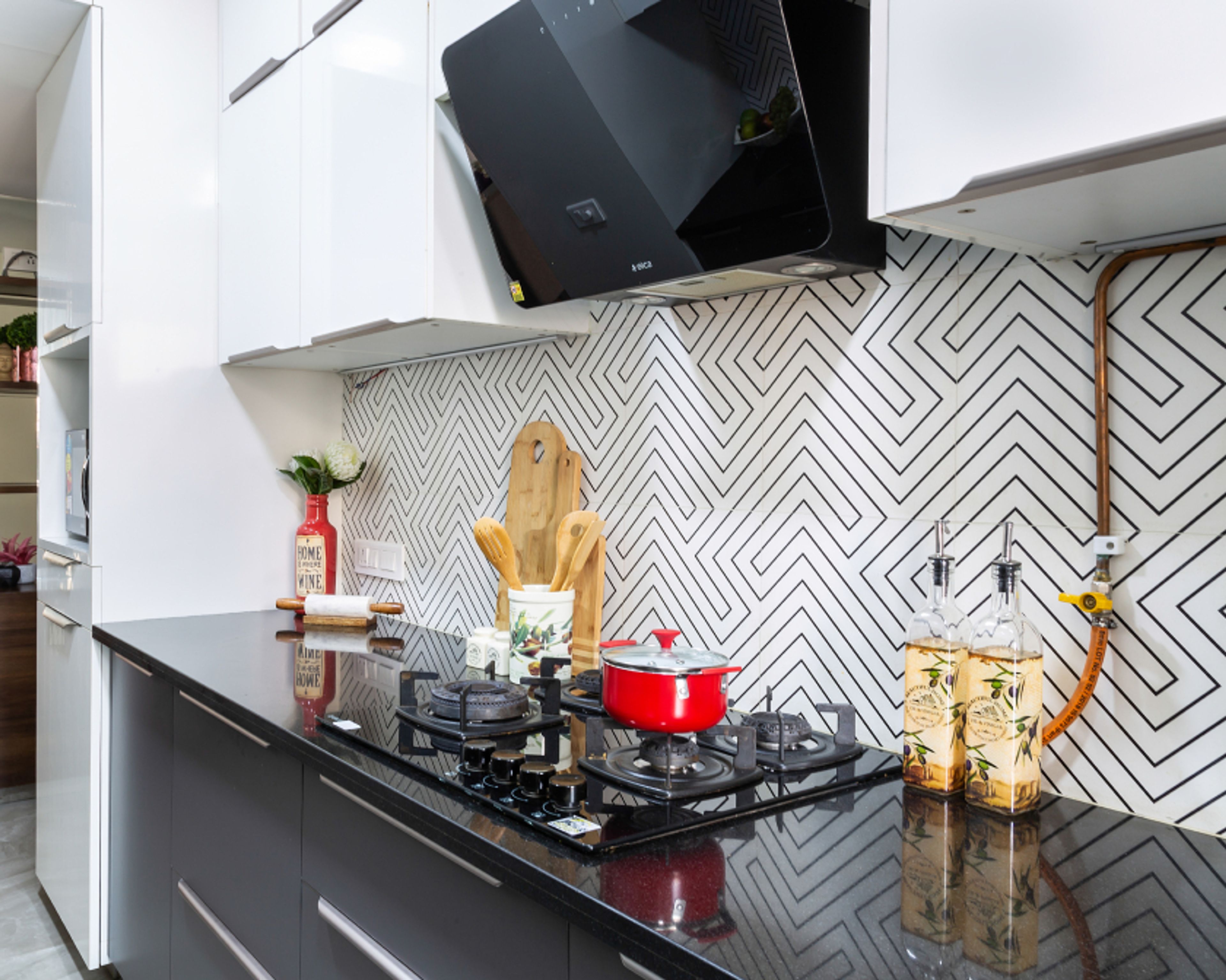 Herringbone-Patterned Kitchen Tiles Design