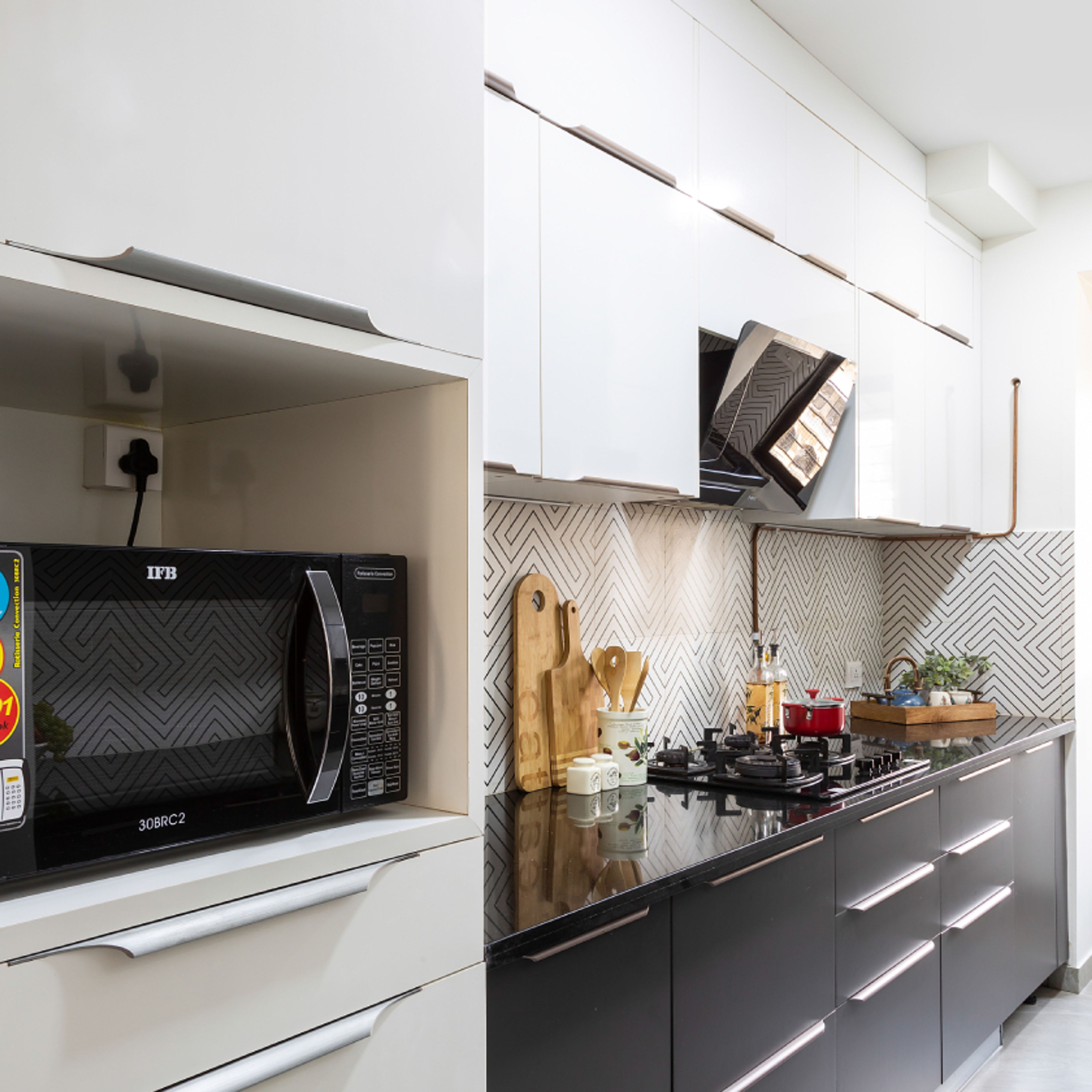Herringbone-Patterned Kitchen Tiles Design