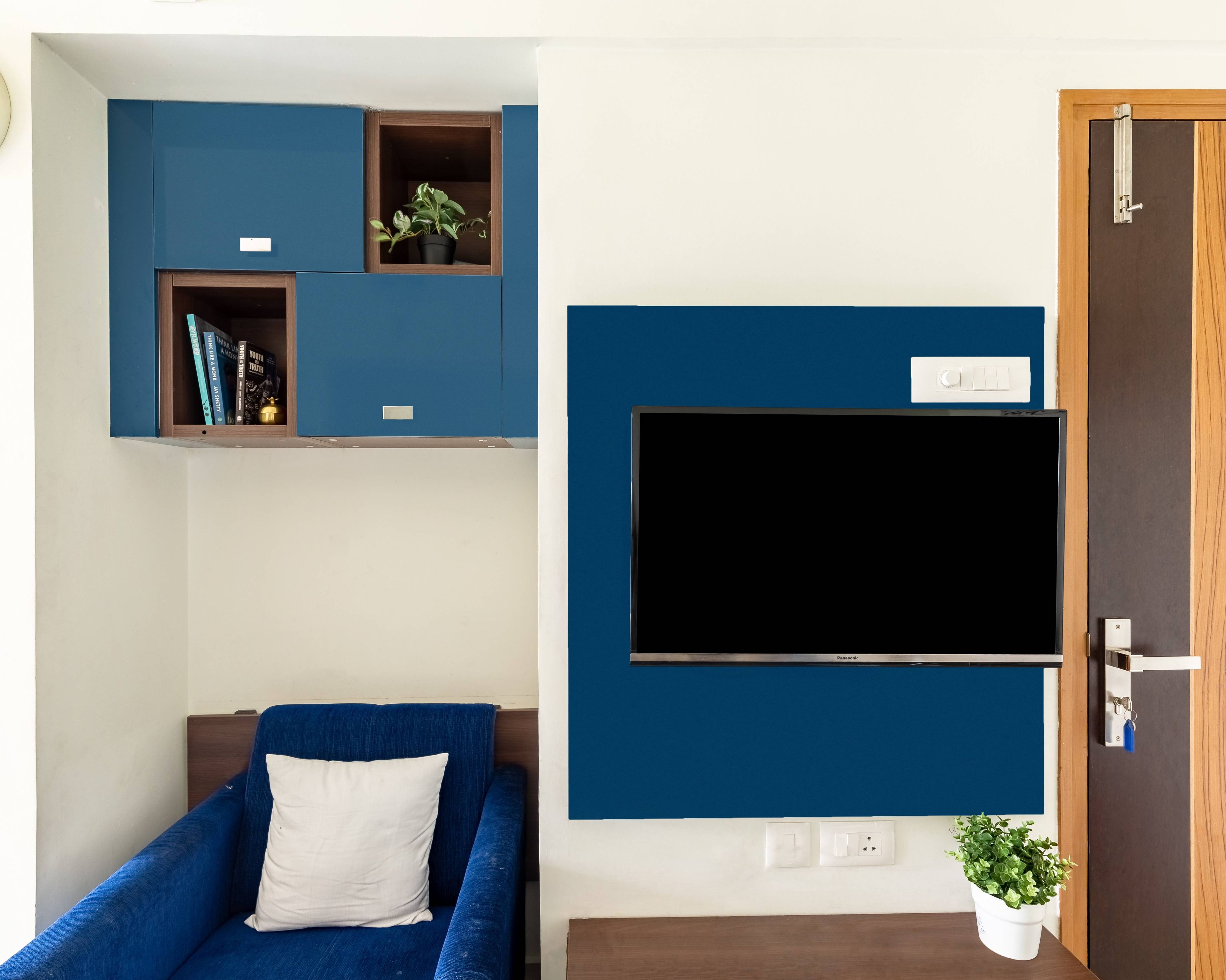 Modern TV Unit Design With Navy Blue Laminates