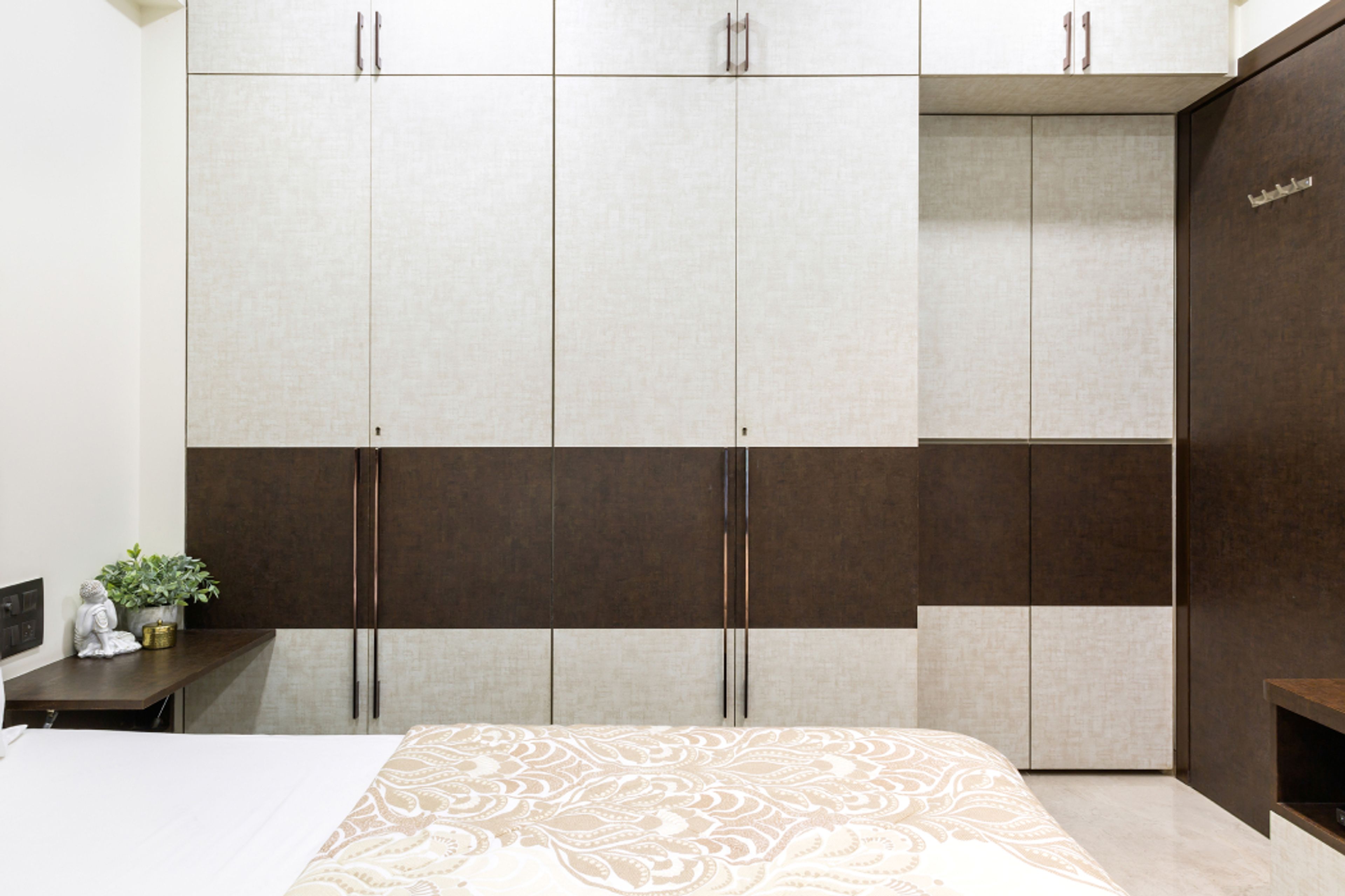 Contemporary Cream And Brown Wardrobe Design With Deco Laminates